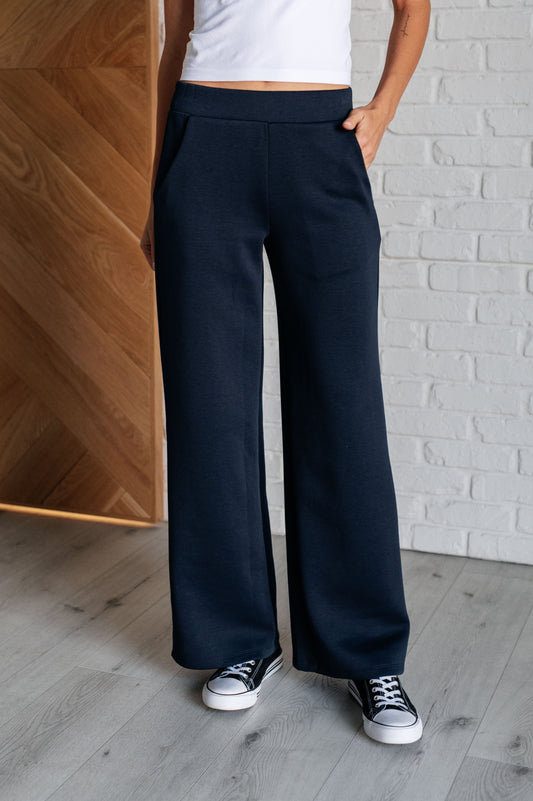 Resort travel wide leg crop pants in Navy by Dear Scarlett
Scuba Modal
Banded Waistline
Cased Elastic Back Waistline
Functional Side Pockets
Wide Leg
95% Polyester, 5% Spandex
True to Size