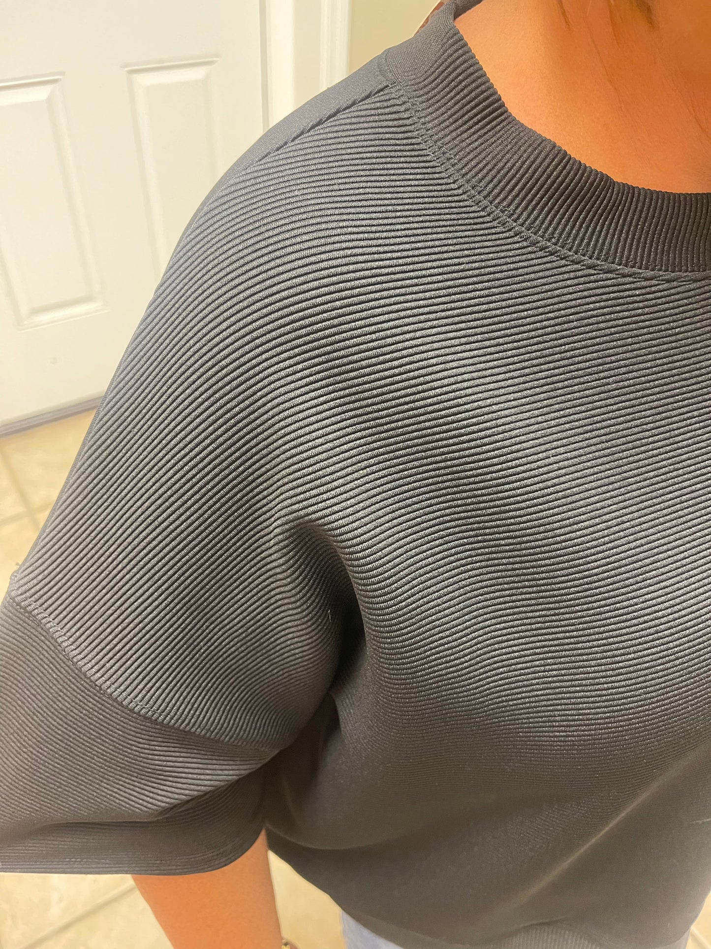 Close up Ribbed Round Neck Waist Banded Top by Zenana