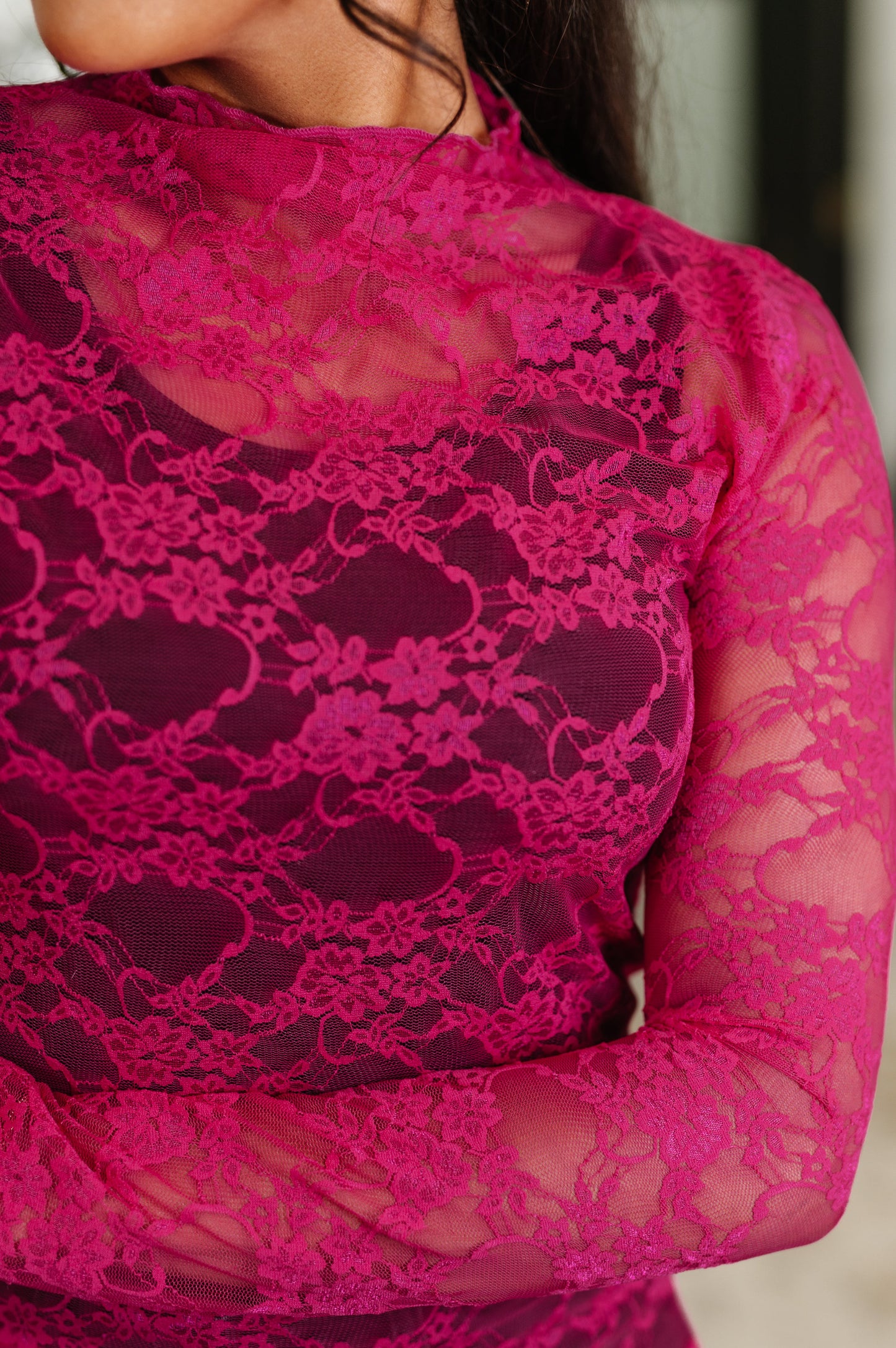 Fuchsia Elastic Lace
High-Stretch
High Neck
Long Sleeve
Sheer
Lettuce Hem, Sleeve Cuff and Neckline
92% Polyester, 8% Spandex
True to Size
