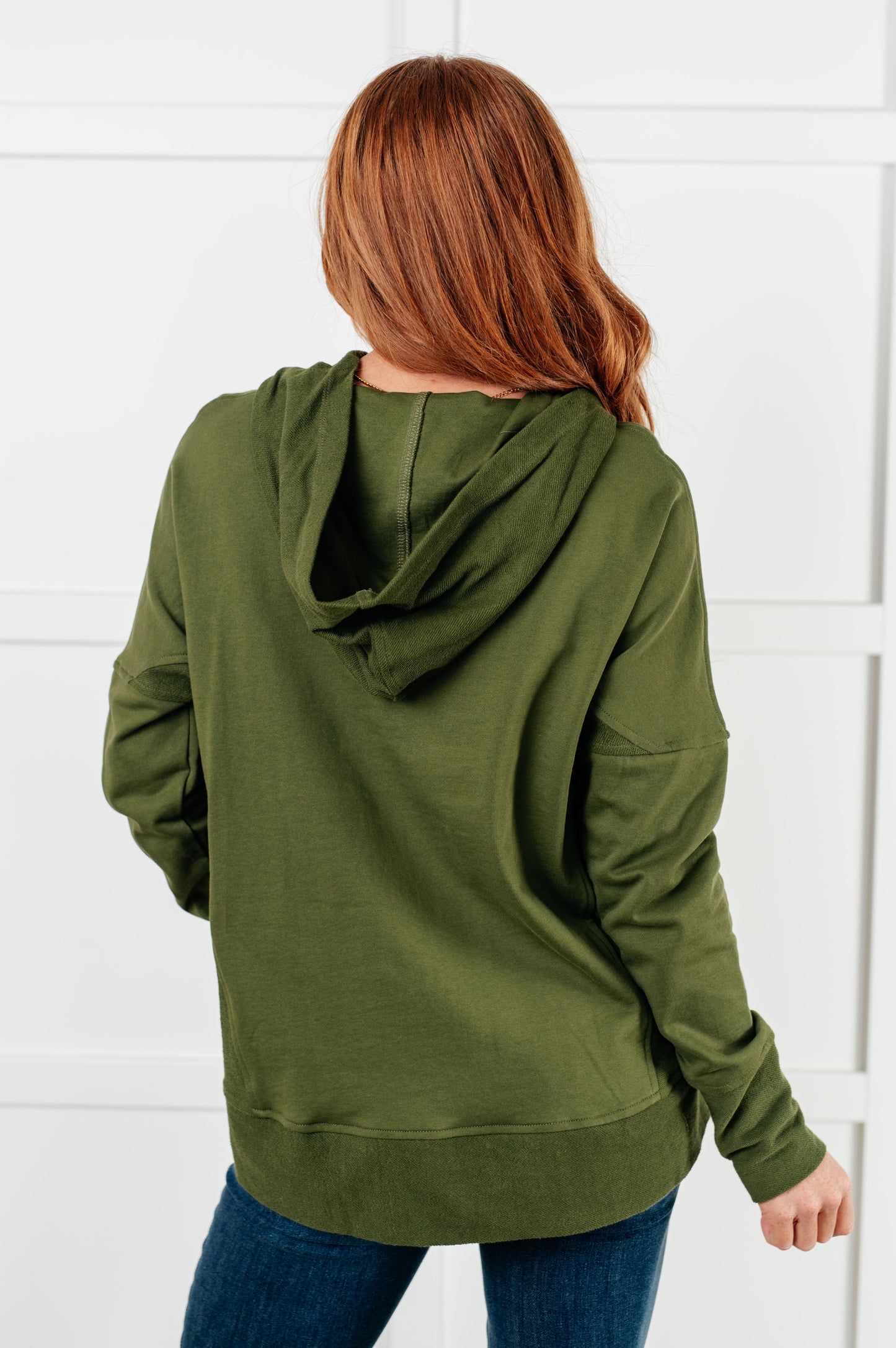 Long sleeve Dark Olive French Terry top by Haptics
Hooded Neckline
Half Front Snap Button Closures
Drop Shoulder
Exaggerated Sleeve Cuff
Faux Kangaroo Pocket
Functional Side Pockets
Contrast Details
100% Cotton
True to Size