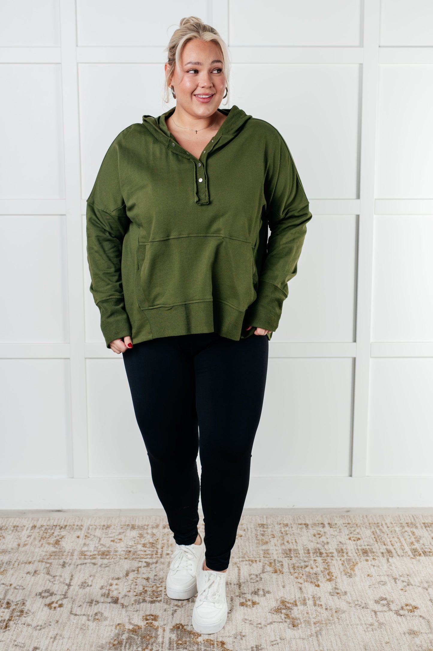 Long sleeve Dark Olive French Terry top by Haptics
Hooded Neckline
Half Front Snap Button Closures
Drop Shoulder
Exaggerated Sleeve Cuff
Faux Kangaroo Pocket
Functional Side Pockets
Contrast Details
100% Cotton
True to Size