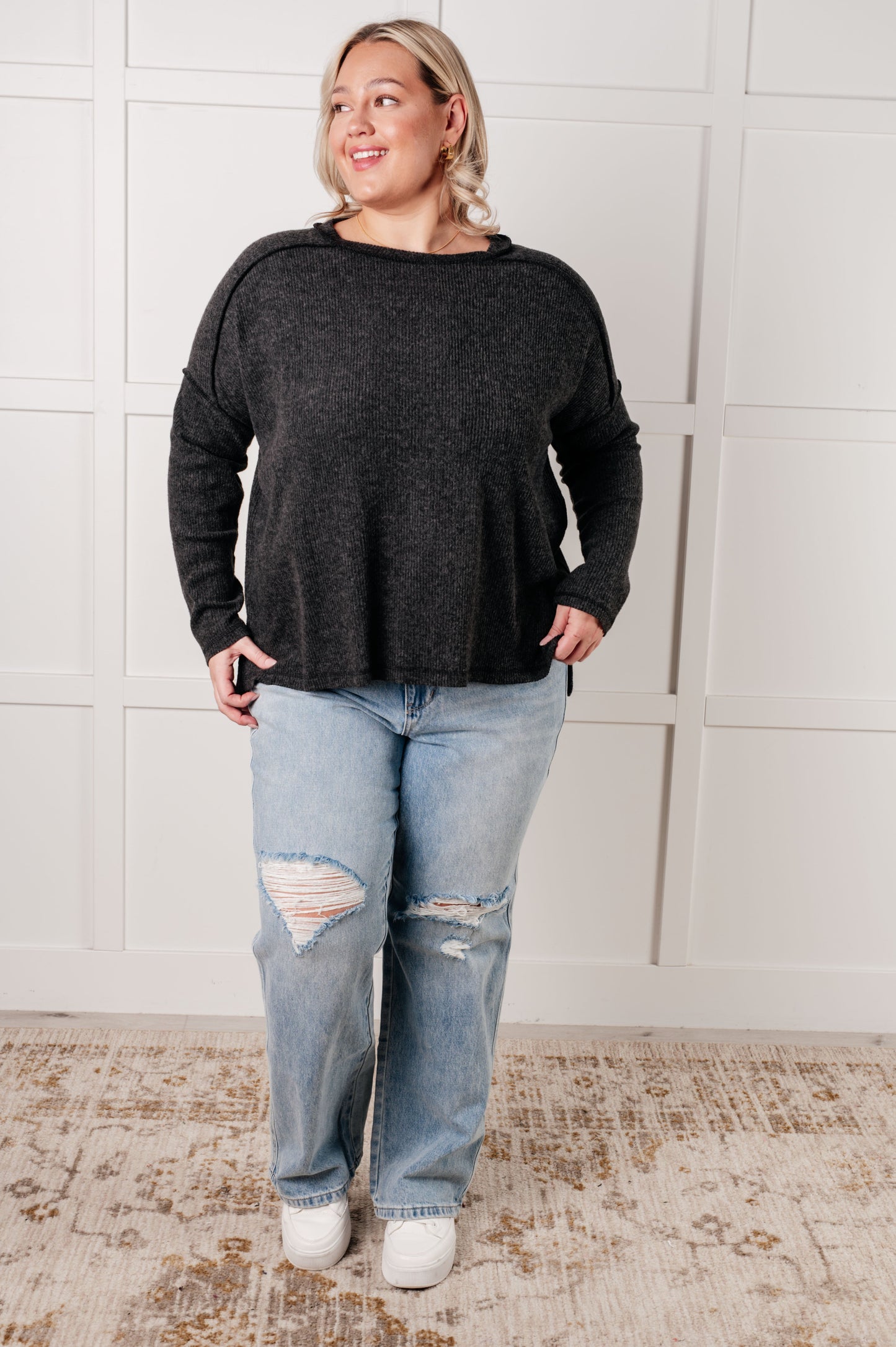 Black, ribbed Hacci long sleeve sweater by Zenana
Ribbed, Brushed Hacci
Banded Round Neckline
Drop Shoulder
Side Slit
Exposed Seam Details
82% Polyester, 15% Rayon, 3% Spandex
True to Size