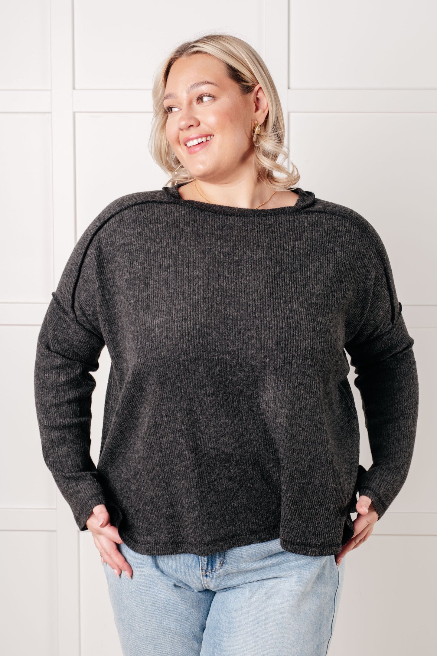 Black, ribbed Hacci long sleeve sweater by Zenana
Ribbed, Brushed Hacci
Banded Round Neckline
Drop Shoulder
Side Slit
Exposed Seam Details
82% Polyester, 15% Rayon, 3% Spandex
True to Size