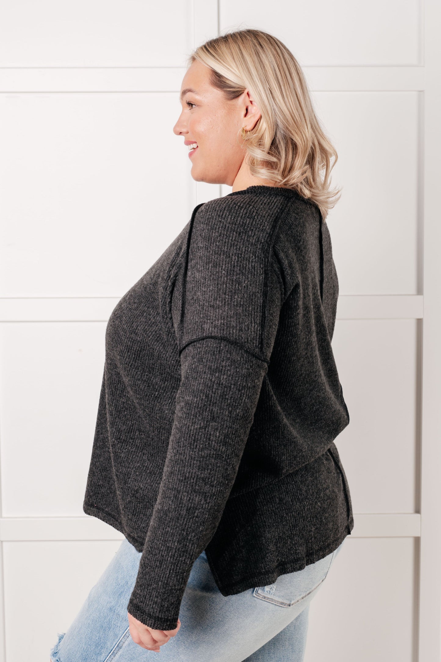 Black, ribbed Hacci long sleeve sweater by Zenana
Ribbed, Brushed Hacci
Banded Round Neckline
Drop Shoulder
Side Slit
Exposed Seam Details
82% Polyester, 15% Rayon, 3% Spandex
True to Size