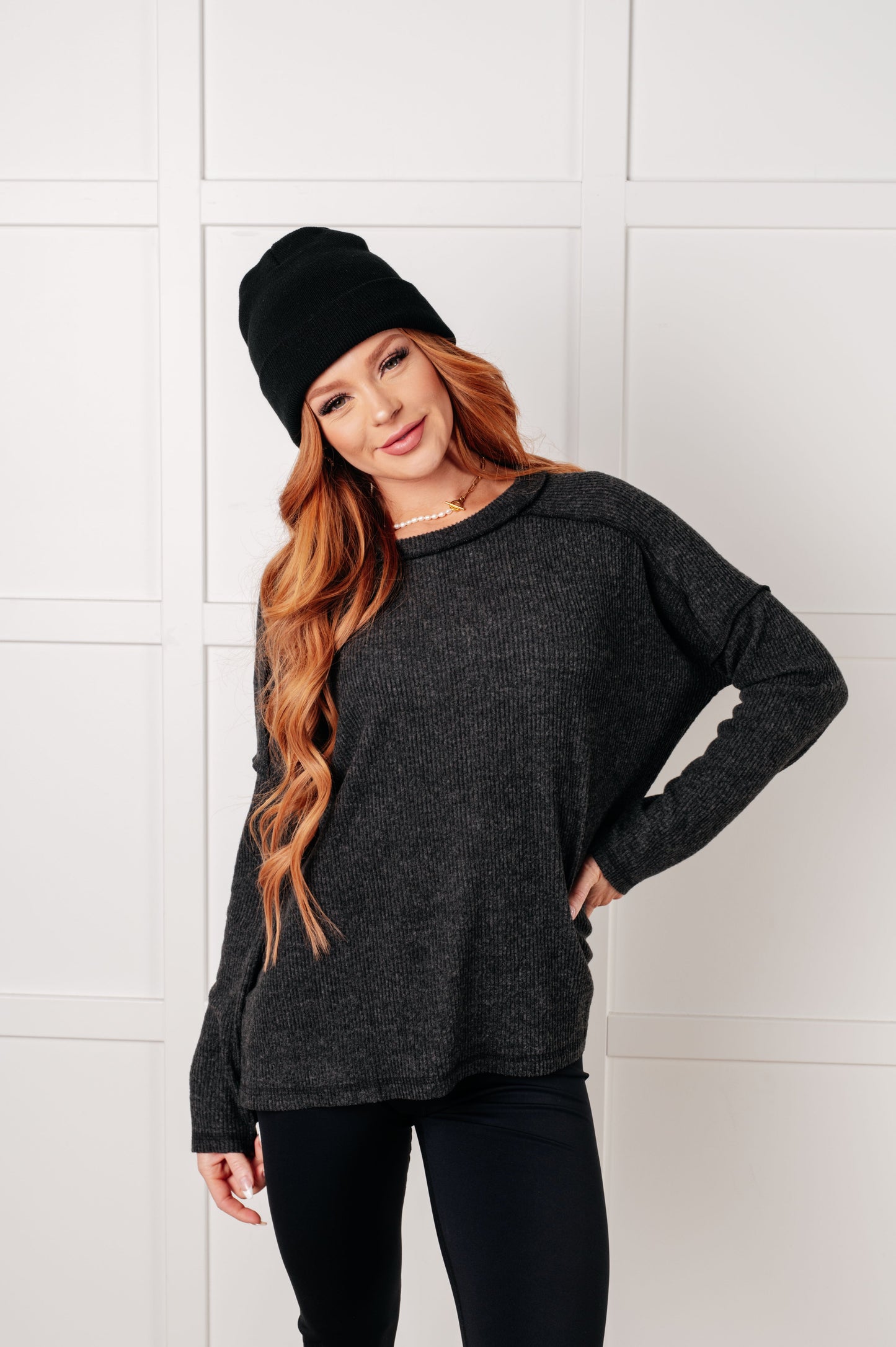 Black, ribbed Hacci long sleeve sweater by Zenana
Ribbed, Brushed Hacci
Banded Round Neckline
Drop Shoulder
Side Slit
Exposed Seam Details
82% Polyester, 15% Rayon, 3% Spandex
True to Size