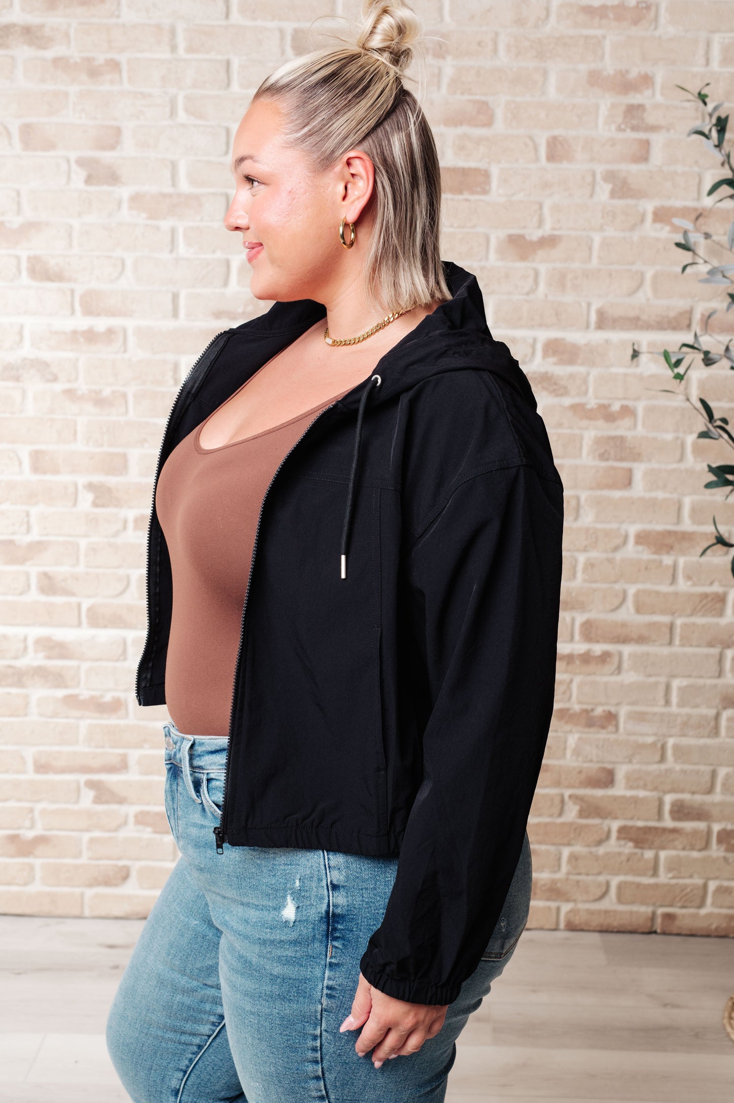 Black 100% Polyester jacket
Windbreaker Material
Front Zipper
Elastic Bottom Band
Functional Pockets
Hood with Drawstring
Windbreaker Material
True to Size