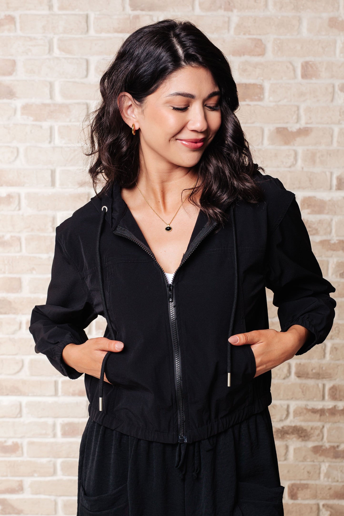 Black 100% Polyester jacket
Windbreaker Material
Front Zipper
Elastic Bottom Band
Functional Pockets
Hood with Drawstring
Windbreaker Material
True to Size