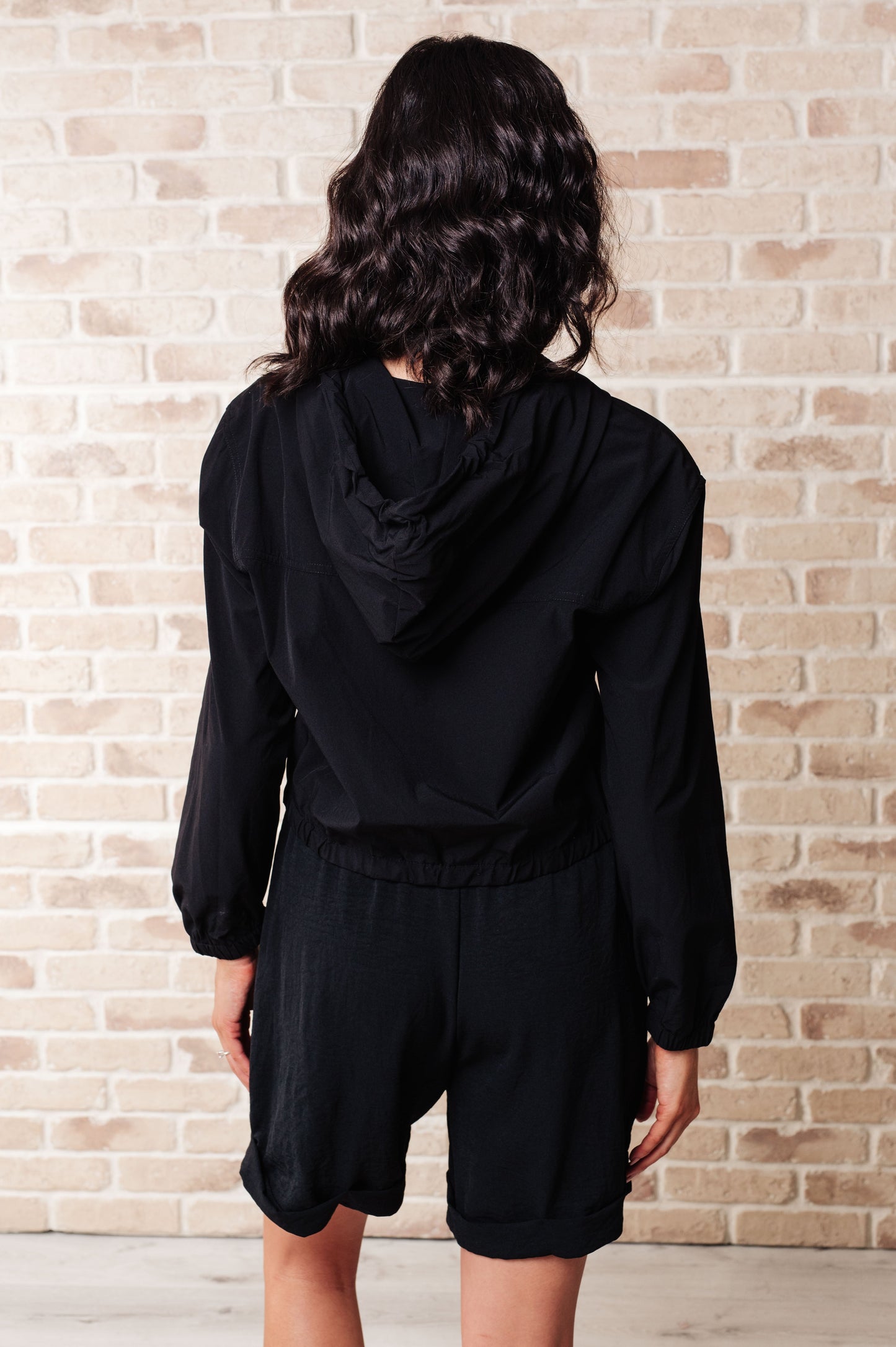Black 100% Polyester jacket
Windbreaker Material
Front Zipper
Elastic Bottom Band
Functional Pockets
Hood with Drawstring
Windbreaker Material
True to Size