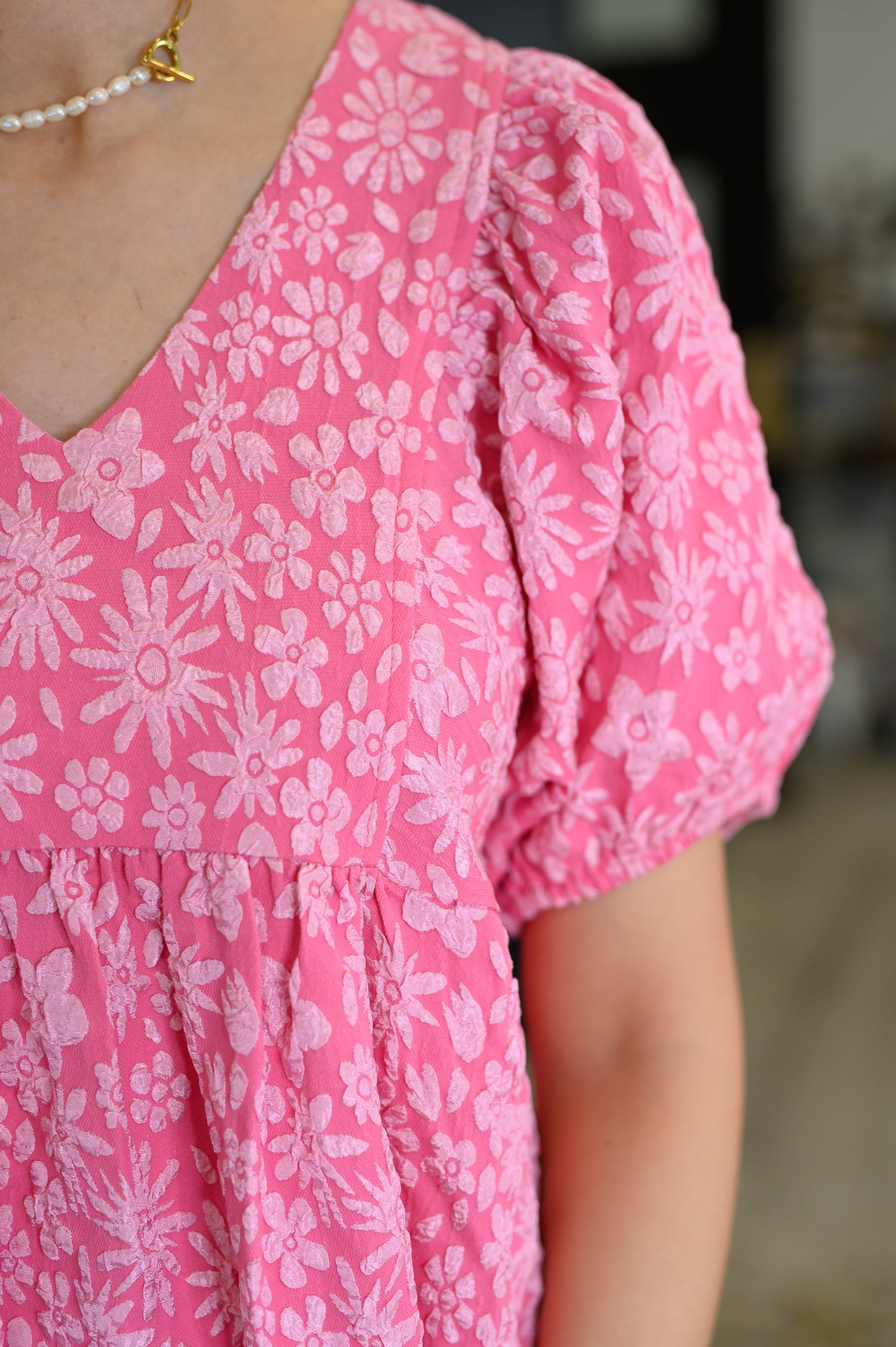 Textured V Neck dress in Ht Pink by Lovelo
Textured Woven
No Stretch
V-Neckline
Balloon Sleeve
Cased Elastic Sleeve Cuff
Gathered Under Bust Seam
Lined Bodice
Self: 100% Polyester
Lining: 100% Rayon
True to Size