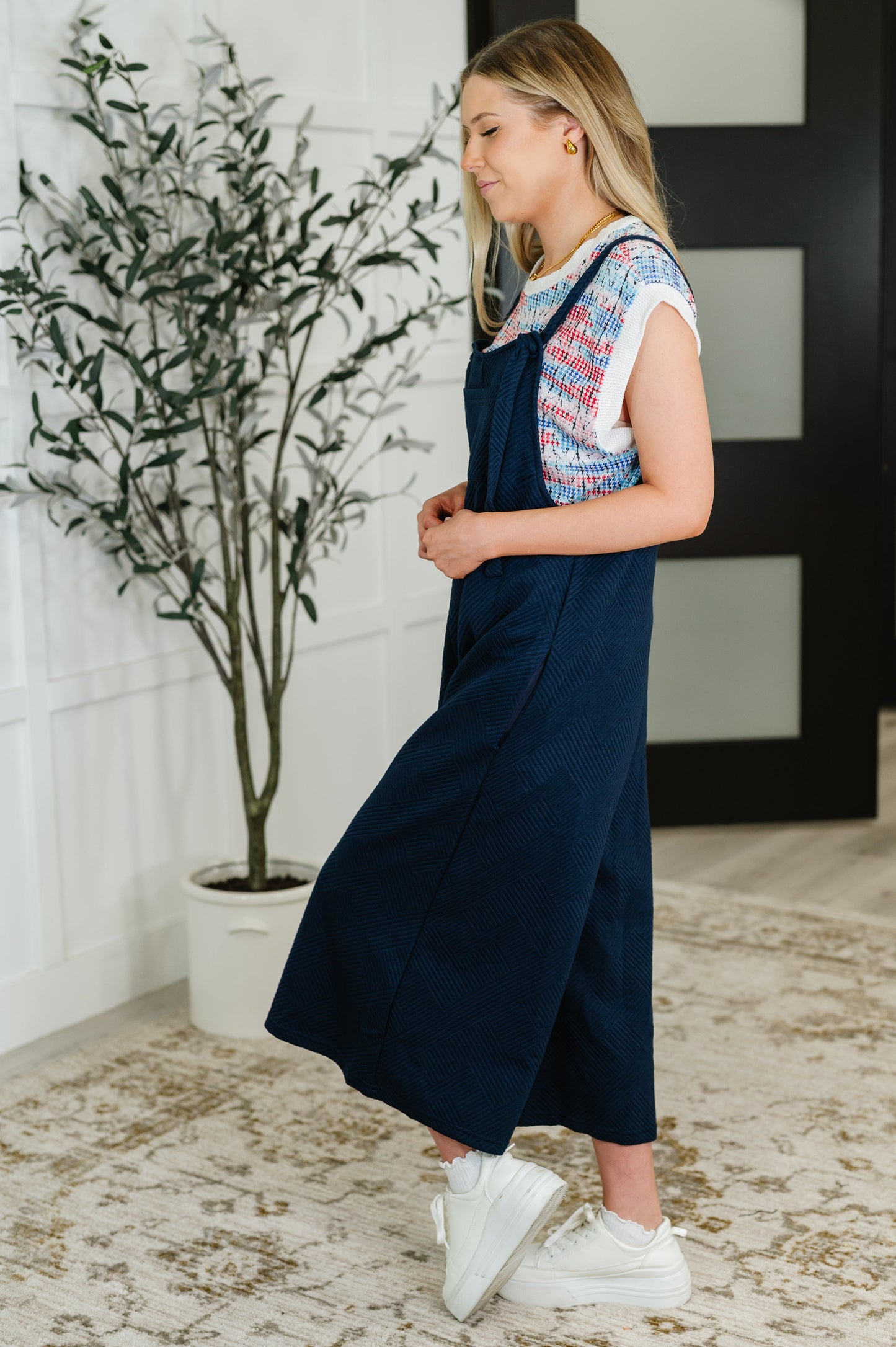 Navy , adjustable strap jumpsuit by See and Be Seen