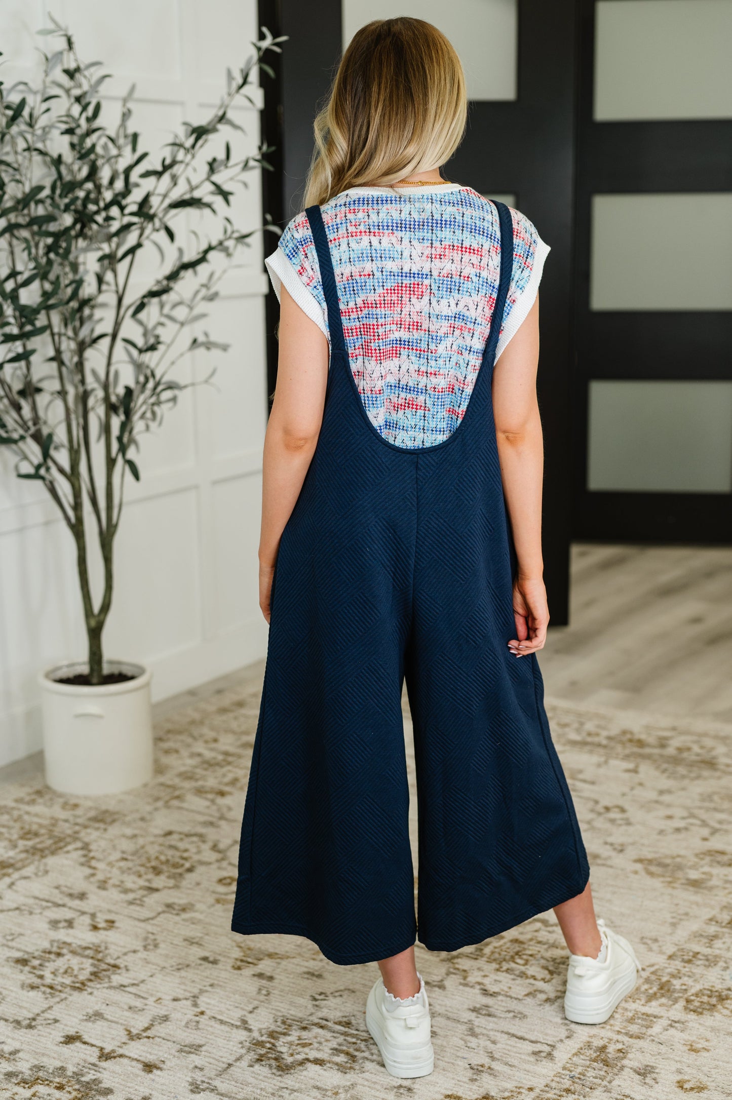 Navy , adjustable strap jumpsuit by See and Be Seen