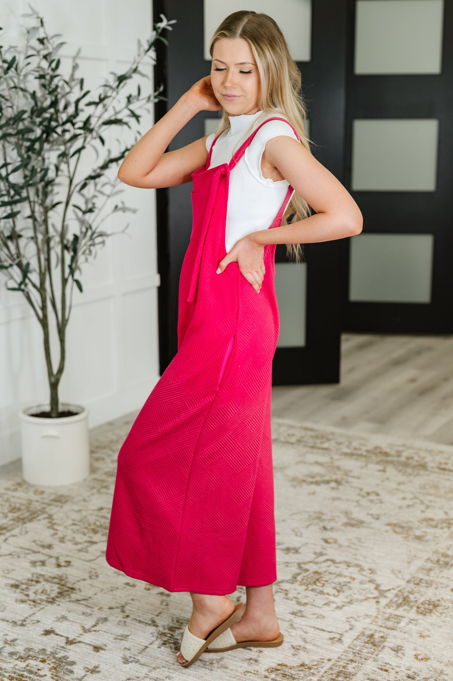 Pink , adjustable strap jumpsuit by See and Be Seen