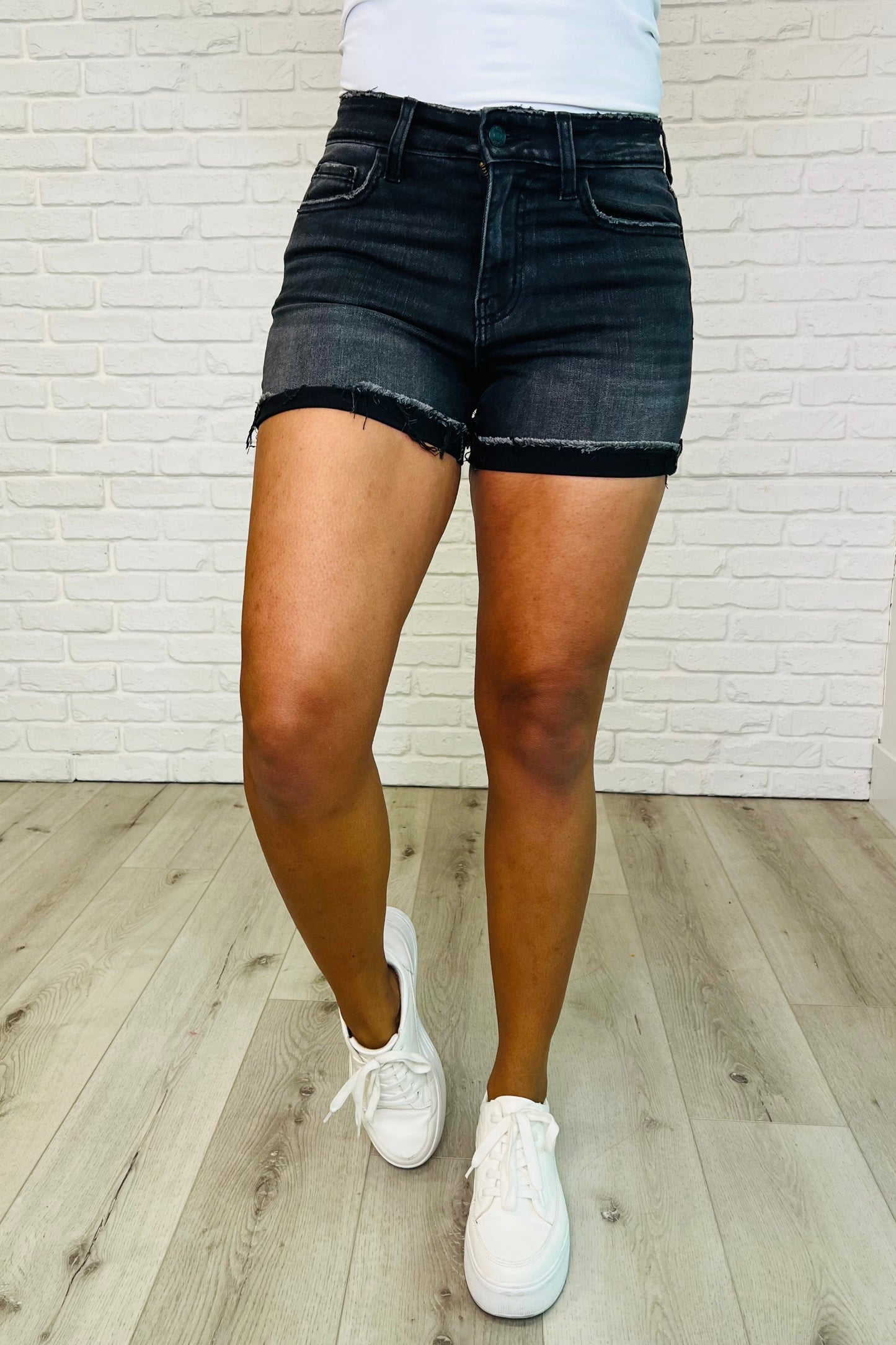 Distressed Hem Shorts in Washed Black by Zenana
Zenana Denim
High Rise
Zip Fly
Washed Black
Folded Raw Cutoff Hem