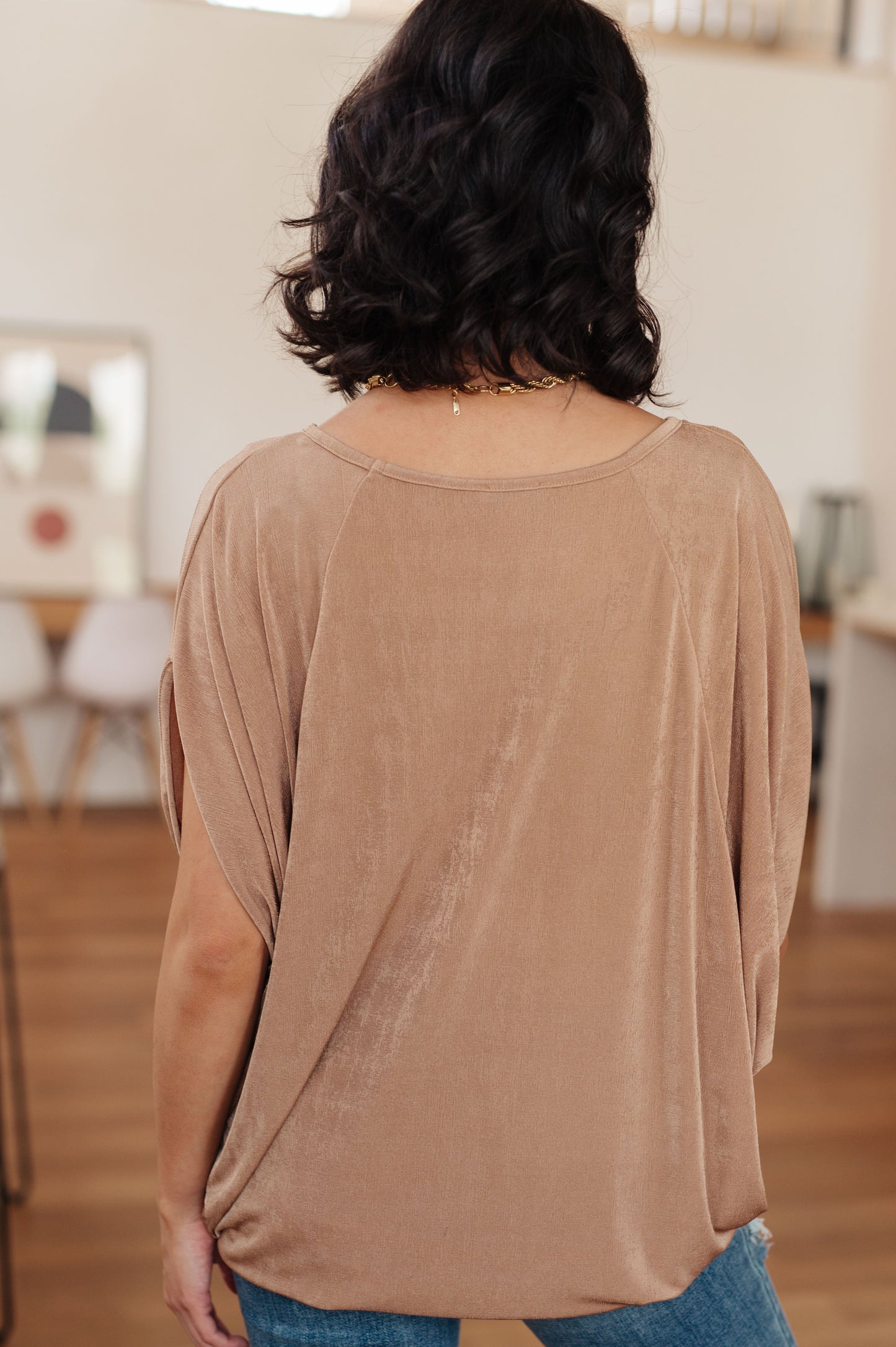 Bulgari Knit top by White Birch
Wide V-Neckline
Draped Batwing Sleeve
95% Polyester, 5% Spandex
True to Size