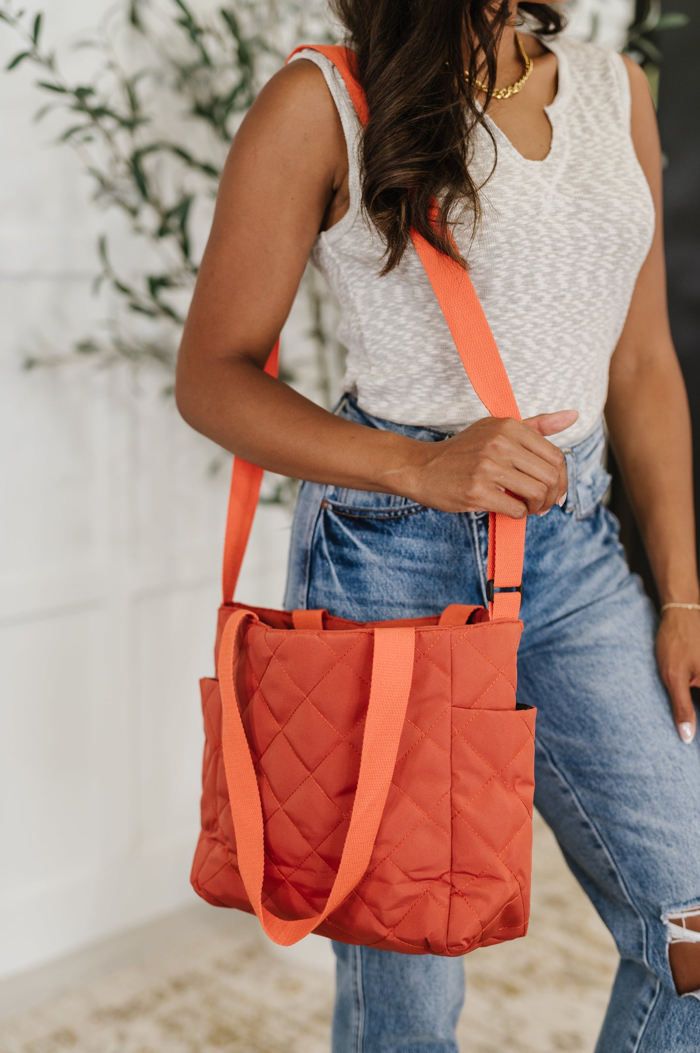Orange quilted tote bag