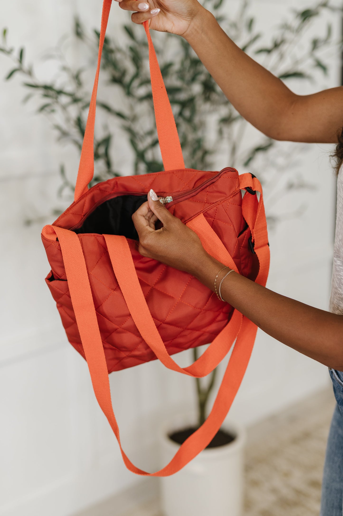 Orange quilted tote bag