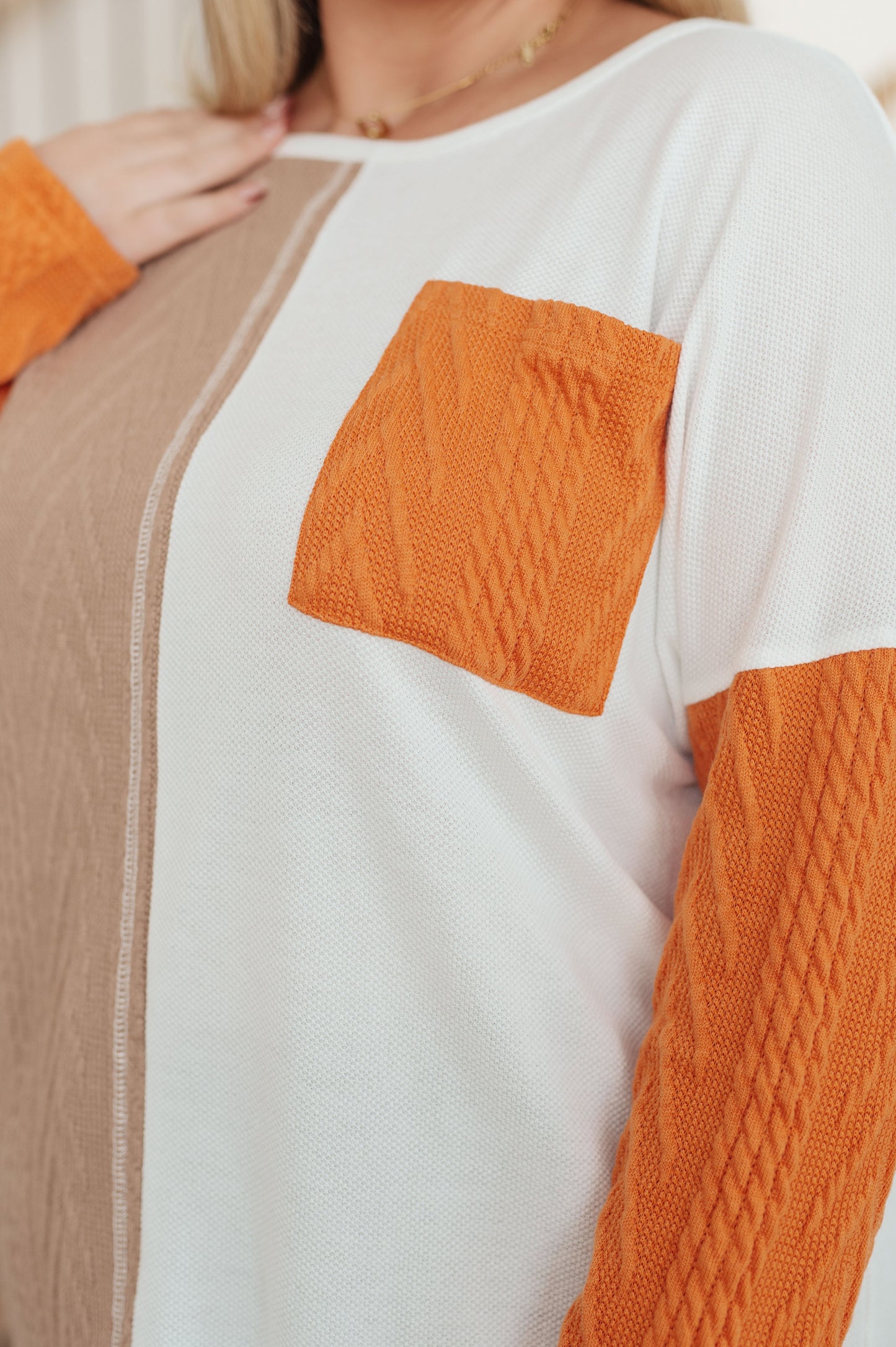 Textured Knit long sleeve color block top
Waffle Stitching
Dropped Shoulder
Patch Pocket
Color Block
75% Polyester, 20% Viscose, 5% Spandex
True to Size