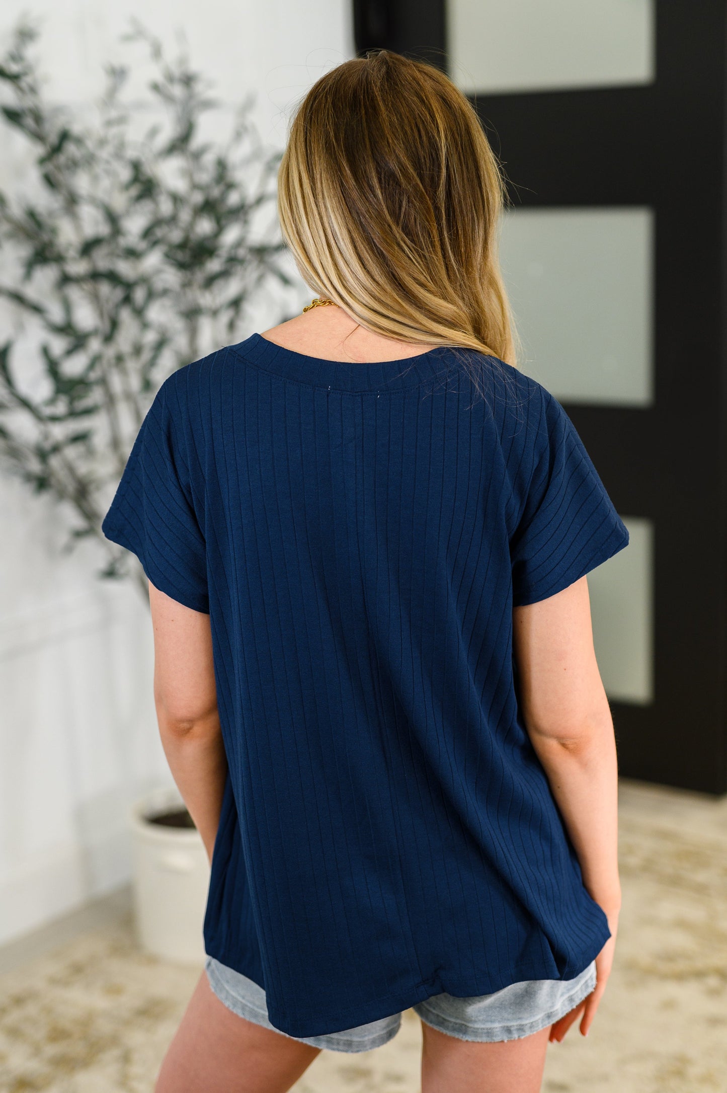 Basic V-Neck Ribbed Tee in Navy
Ribbed Knit
High Stretch
Banded V-Neckline
Dolman Sleeve
Back Center Seam
70% Polyester, 25% Rayon, 5% Spandex
True to Size