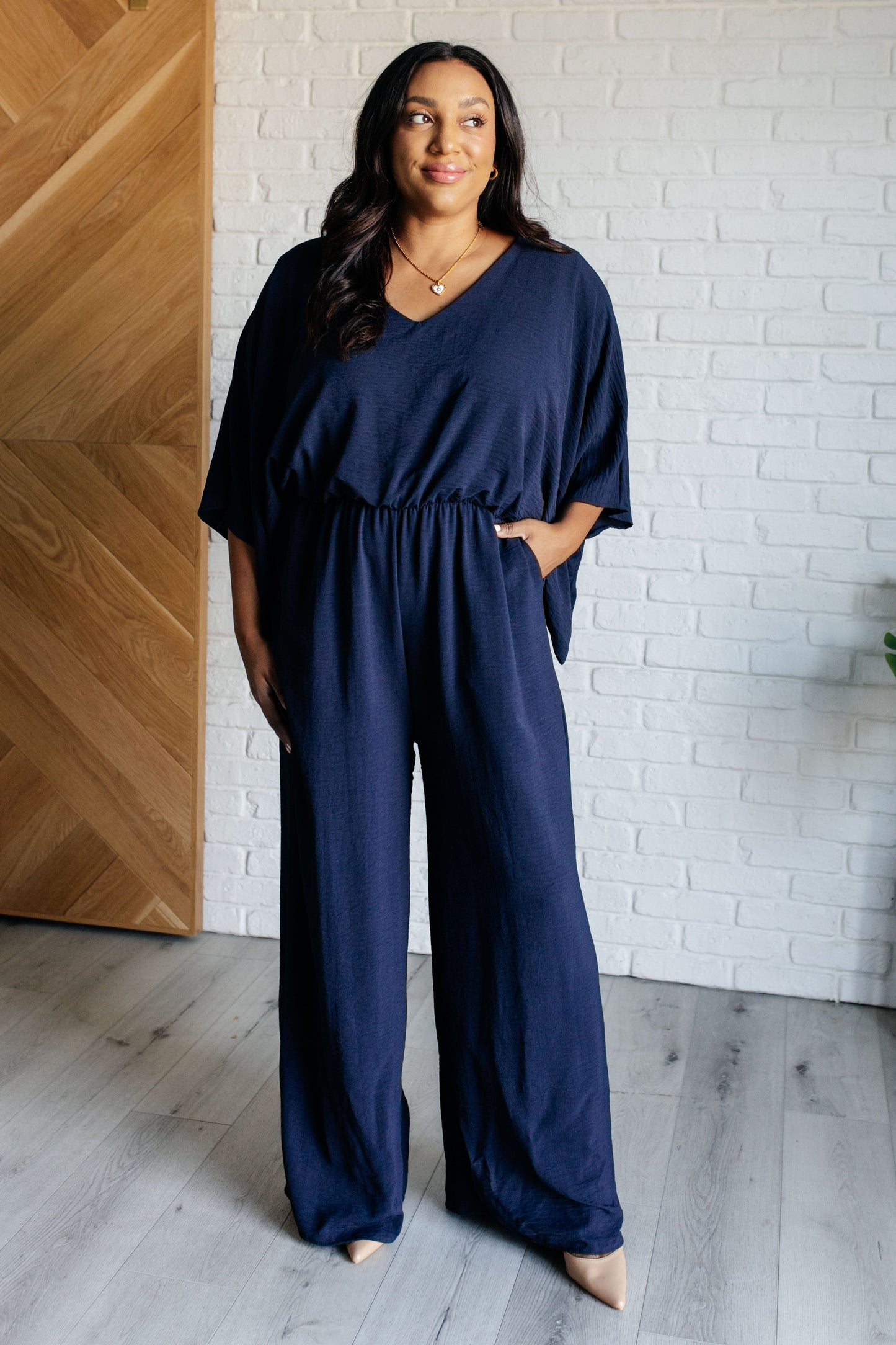 Navy Blue Wide Leg jumpsuit
Crinkle Woven
V-Neckline
Kimono Sleeve
Elastic Waistline
Functional Side Pockets
Wide Leg
Keyhole Button Closure
100% Polyester
True to Size