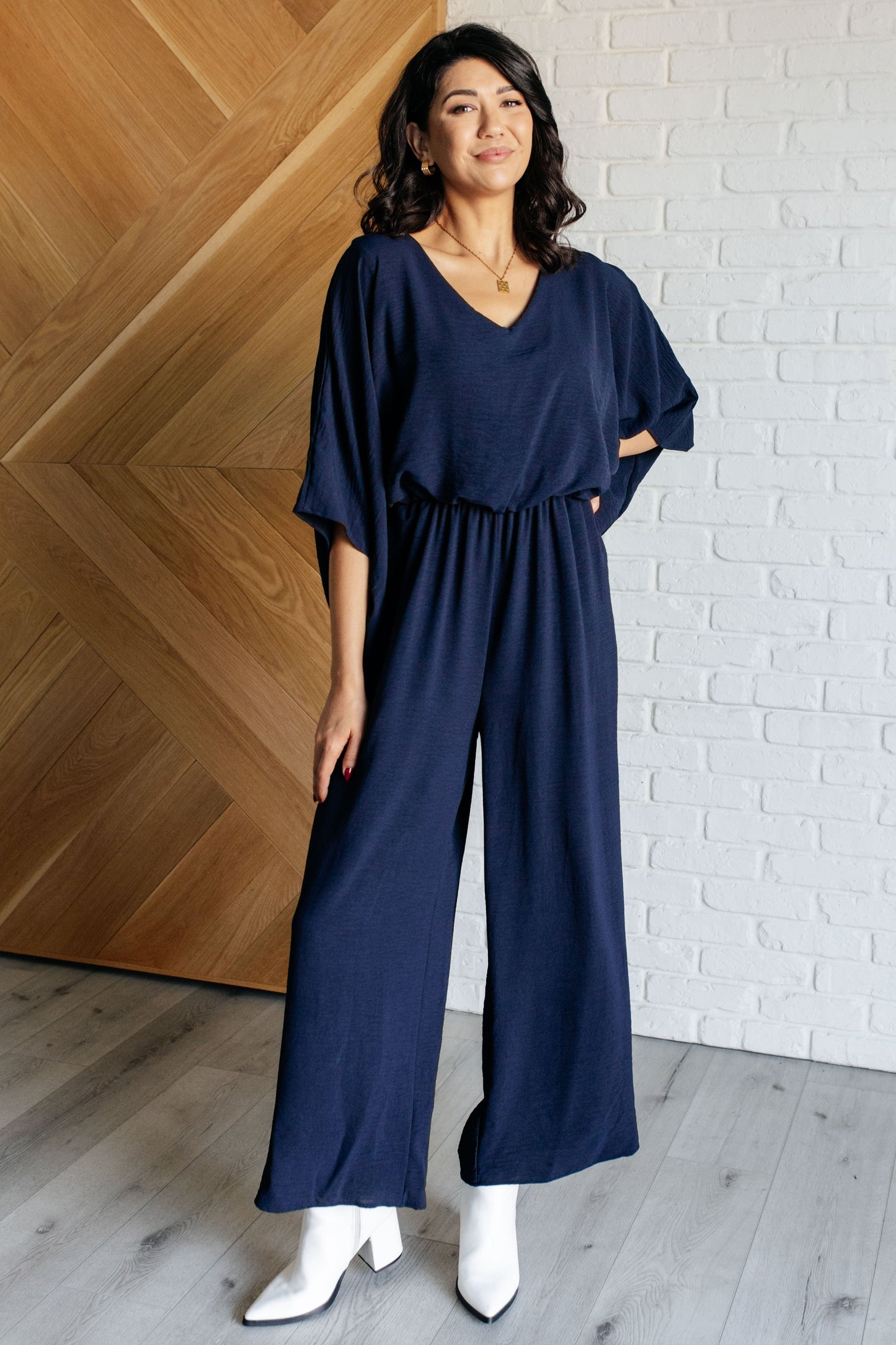 Navy Blue Wide Leg jumpsuit
Crinkle Woven
V-Neckline
Kimono Sleeve
Elastic Waistline
Functional Side Pockets
Wide Leg
Keyhole Button Closure
100% Polyester
True to Size