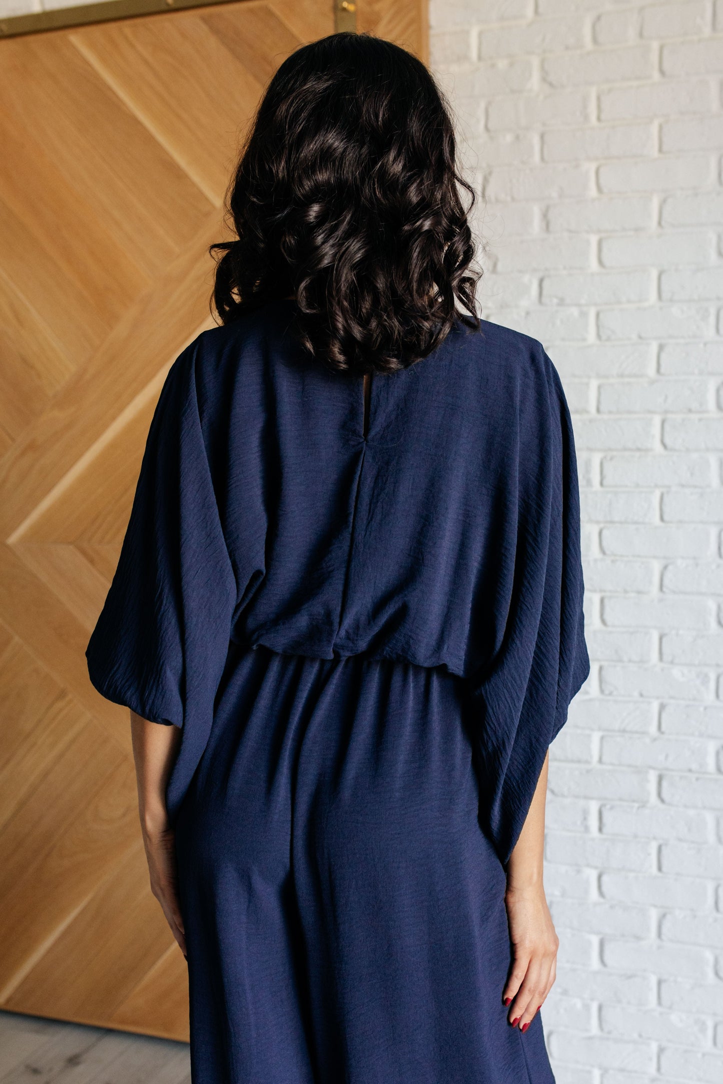 Navy Blue Wide Leg jumpsuit
Crinkle Woven
V-Neckline
Kimono Sleeve
Elastic Waistline
Functional Side Pockets
Wide Leg
Keyhole Button Closure
100% Polyester
True to Size