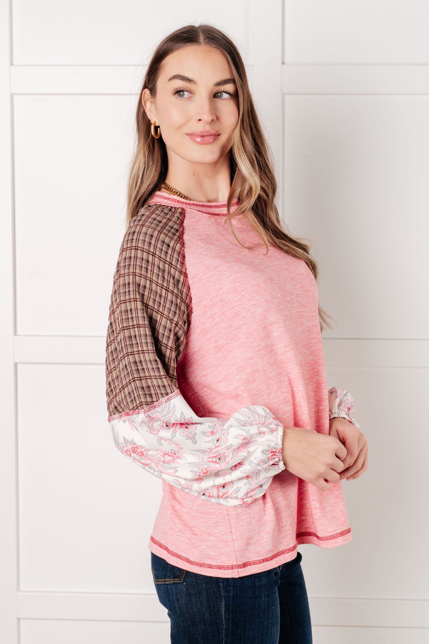 Knit Bodice long sleeve
Woven Contrast
Banded, Round Neckline
Raglan Balloon Sleeve
Cased Elastic Sleeve Cuff
Raw Edge Details
85% Polyester, 10% Viscose, 5% Elastane
True to Size