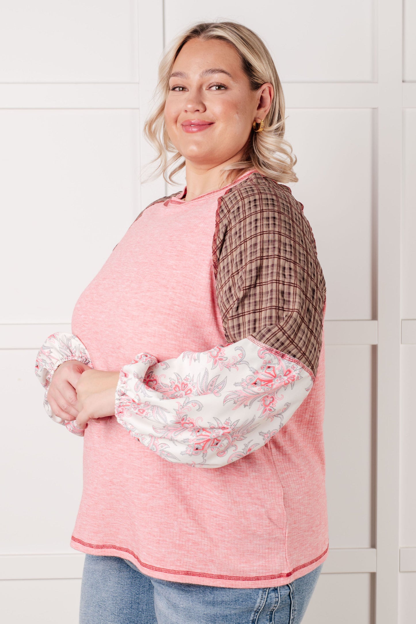 Knit Bodice long sleeve
Woven Contrast
Banded, Round Neckline
Raglan Balloon Sleeve
Cased Elastic Sleeve Cuff
Raw Edge Details
85% Polyester, 10% Viscose, 5% Elastane
True to Size