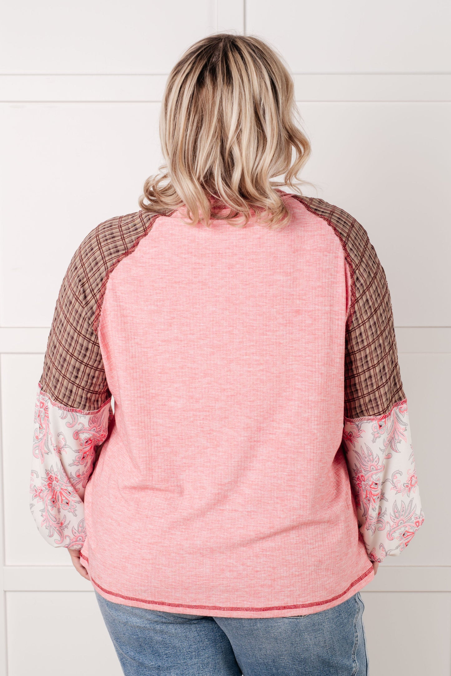 Knit Bodice long sleeve
Woven Contrast
Banded, Round Neckline
Raglan Balloon Sleeve
Cased Elastic Sleeve Cuff
Raw Edge Details
85% Polyester, 10% Viscose, 5% Elastane
True to Size