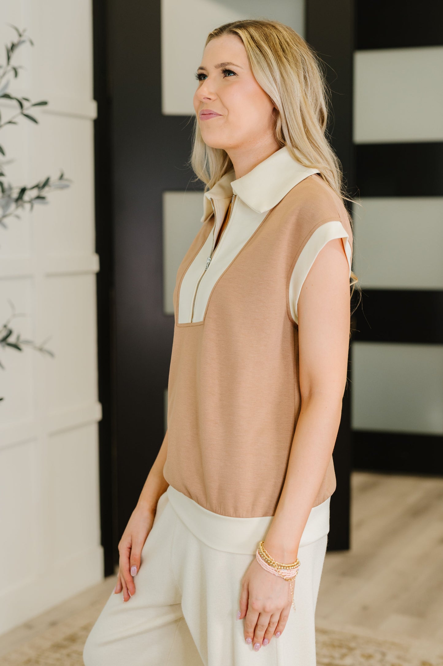 Scuba Knit short sleeve top
High Stretch
Collared Neckline
Half Front Zip
Banded Sleeve Cuff
Banded Hemline
50% Polyester, 45% Viscose, 5% Elastane
True to Size