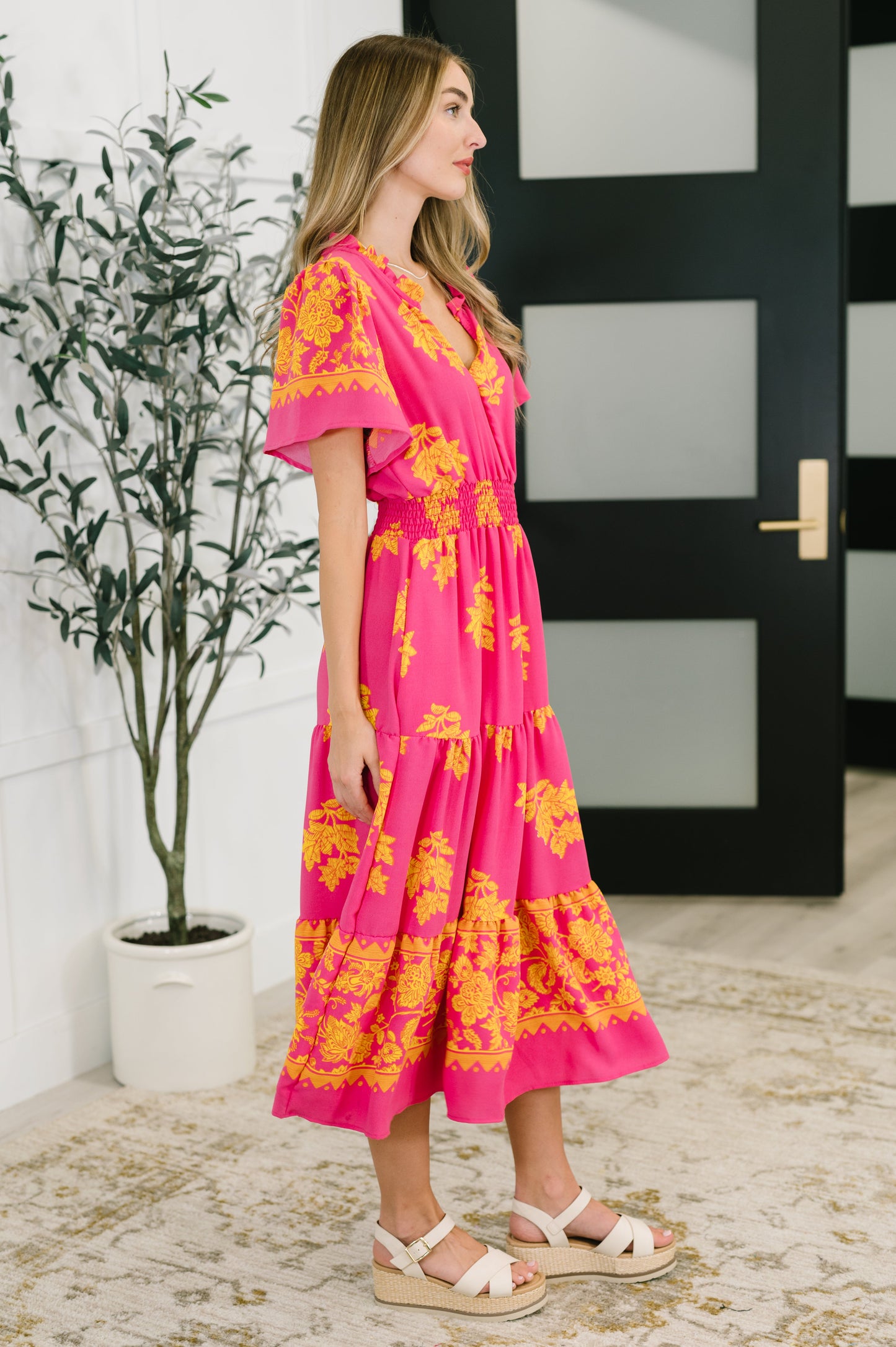 Pink floral, short sleeve dress by Haptics
Lightweight Woven
No Stretch
V-Neckline
Flutter Sleeve
Smocked Elastic Waistband
Functional Side Pockets
Ruffle Details
Gathered Tiers
100% Polyester
True to Size