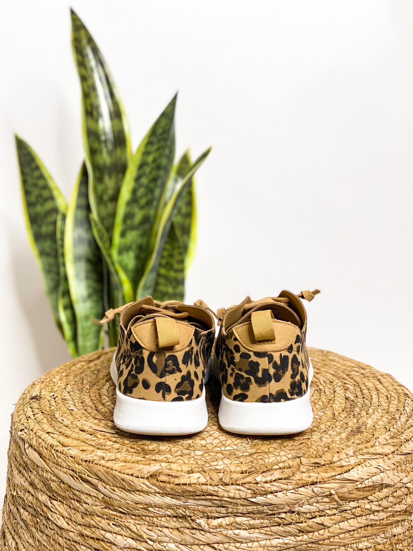 Leopard print, faux suede, faux leather laces, rubber sole sneakers