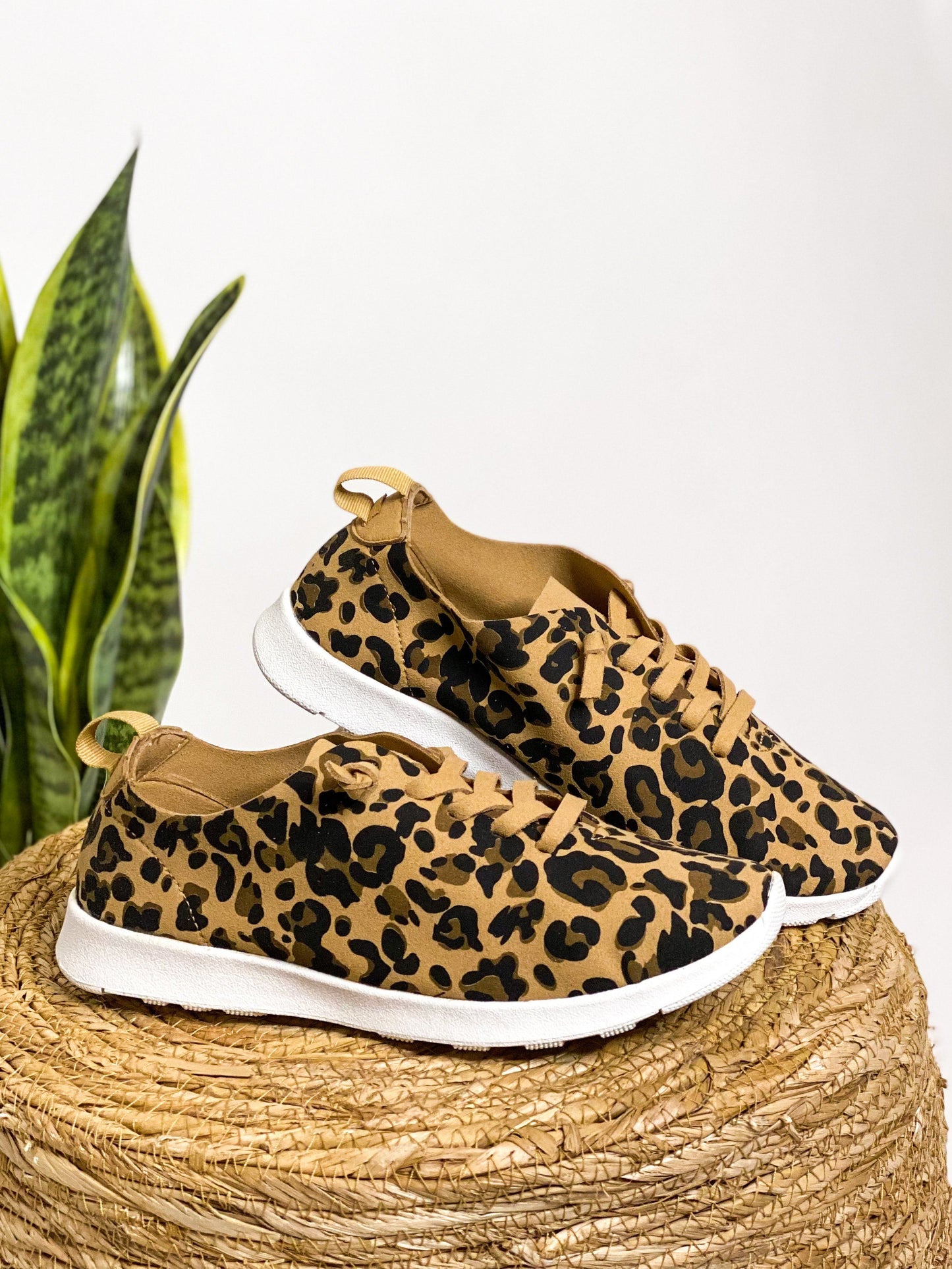 Leopard print, faux suede, faux leather laces, rubber sole sneakers