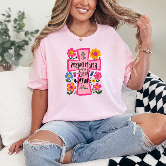 Praying Mama Raising Warriors graphic tee
Gildan tee
Multicolor DTF printing on crewneck
True to size for a relaxed unisex fit