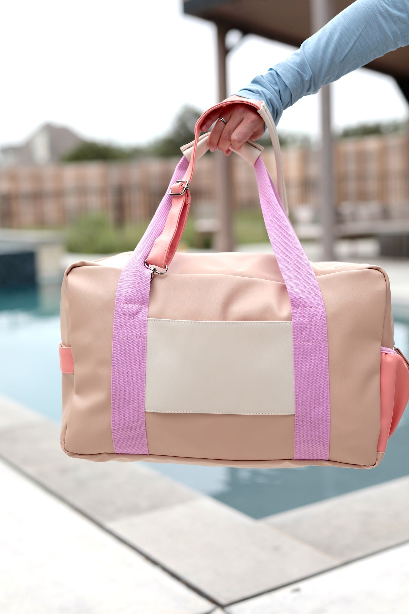 Monogram-style personalized duffle bag designed for everyday and weekend travel
