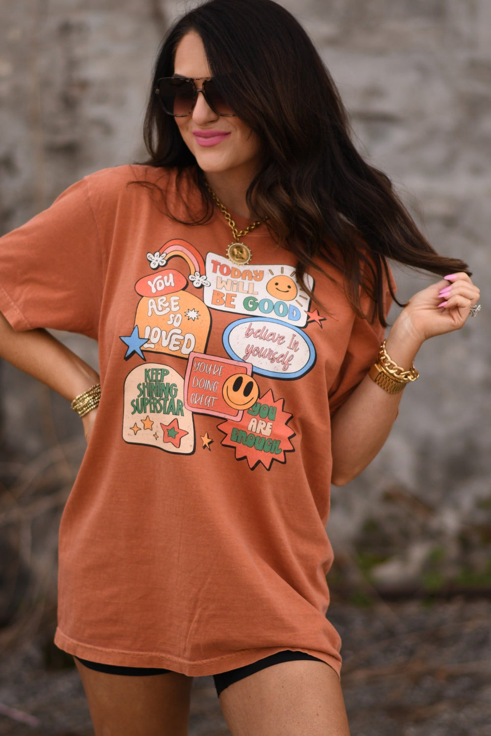 Affirmation stickers graphic tee on Comfort Colors yam shirt featuring positive messages like believe in yourself and today will be good retro motivational design