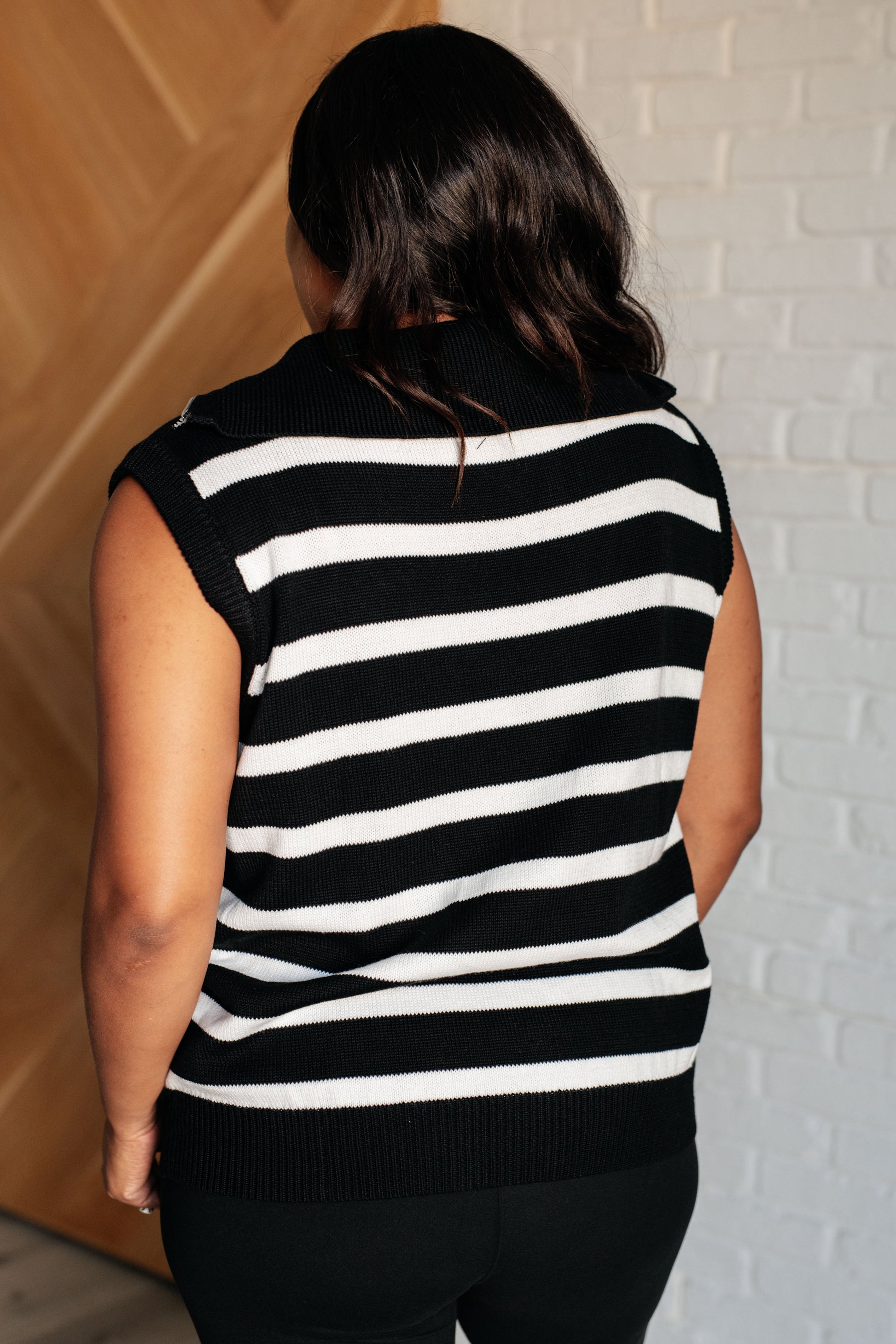 Black and White striped
Sweater Knit
Collared Neckline
Half Zip Closure
Sleeveless
Banded Ribbed Sleeve Cuff
Banded Ribbed Hemline
55% Acrylic, 45% Cotton
Sleeveless
True to Size