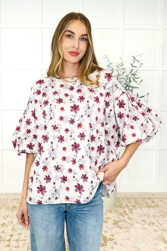 Light-Weight Knit
Round Neckline
Puff Sleeve
Cased Elastic Sleeve Cuff
Lined Sleeve
Exposed Seam Details
Self: 100% Polyester
Lining: 100% Polyester
True to Size
Floral print top by Easel