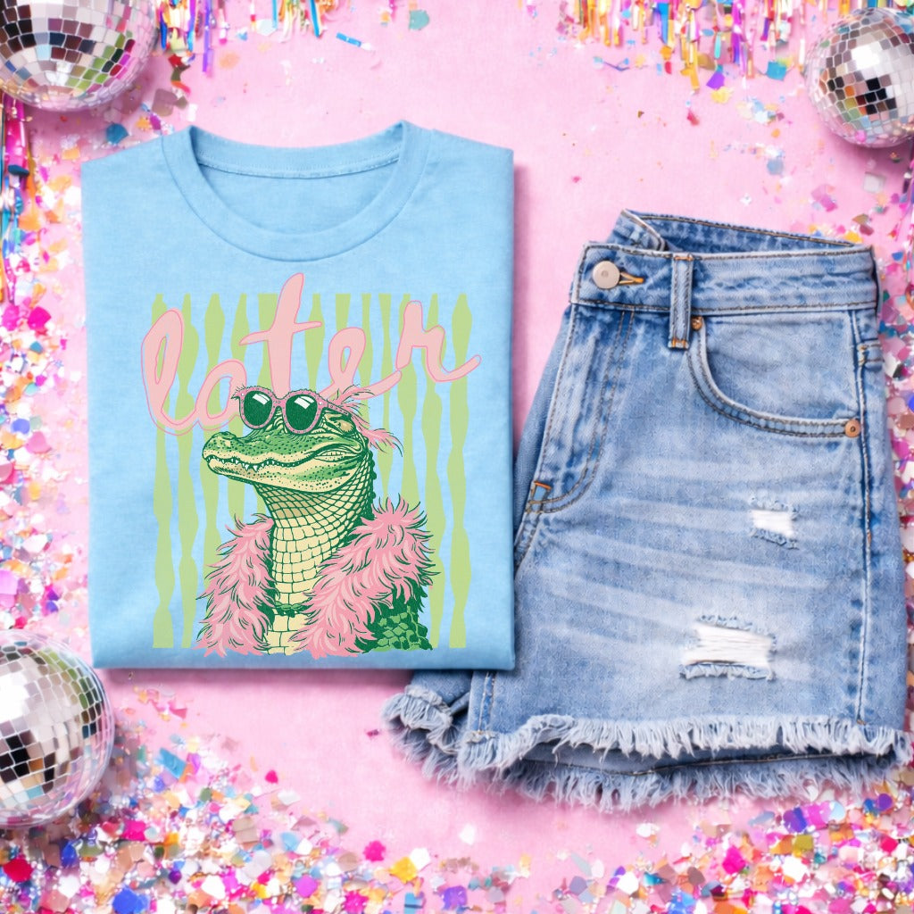 Blue Boujee Later Gator graphic t-shirt with stylish alligator wearing sunglasses and feather boa, trendy boutique tee