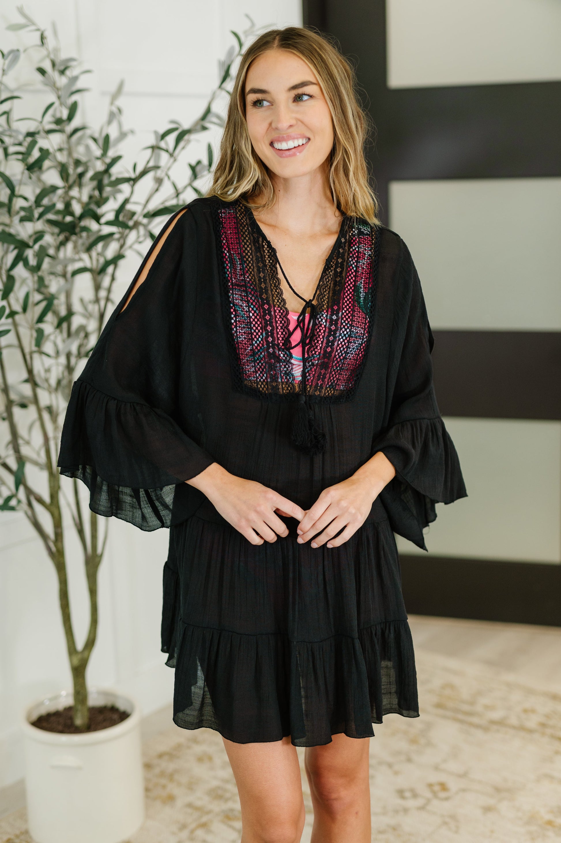 Black Sheer Lightweight Woven Swim Cover Up
No-Stretch
V-Neckline
Functional Neck Tie
Lace Details
Shoulder Cutout
Tiered
Ruffle Sleeve Cuff
100% Polyester
True to Size