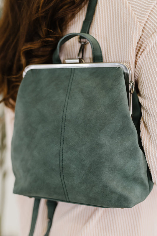 Backpack in Peacock
10.5″ Tall
9″ Wide
4″ Deep
Brass Plated Clasp Closure At Top
22" Adjustable and Removable Crossbody Strap
16" Adjustable and Removable Backpack Strap
Vertical Zipper Closure In Back
Zipper Closure Pocket Inside
Floral Printed Lining
100% Vegan Leather