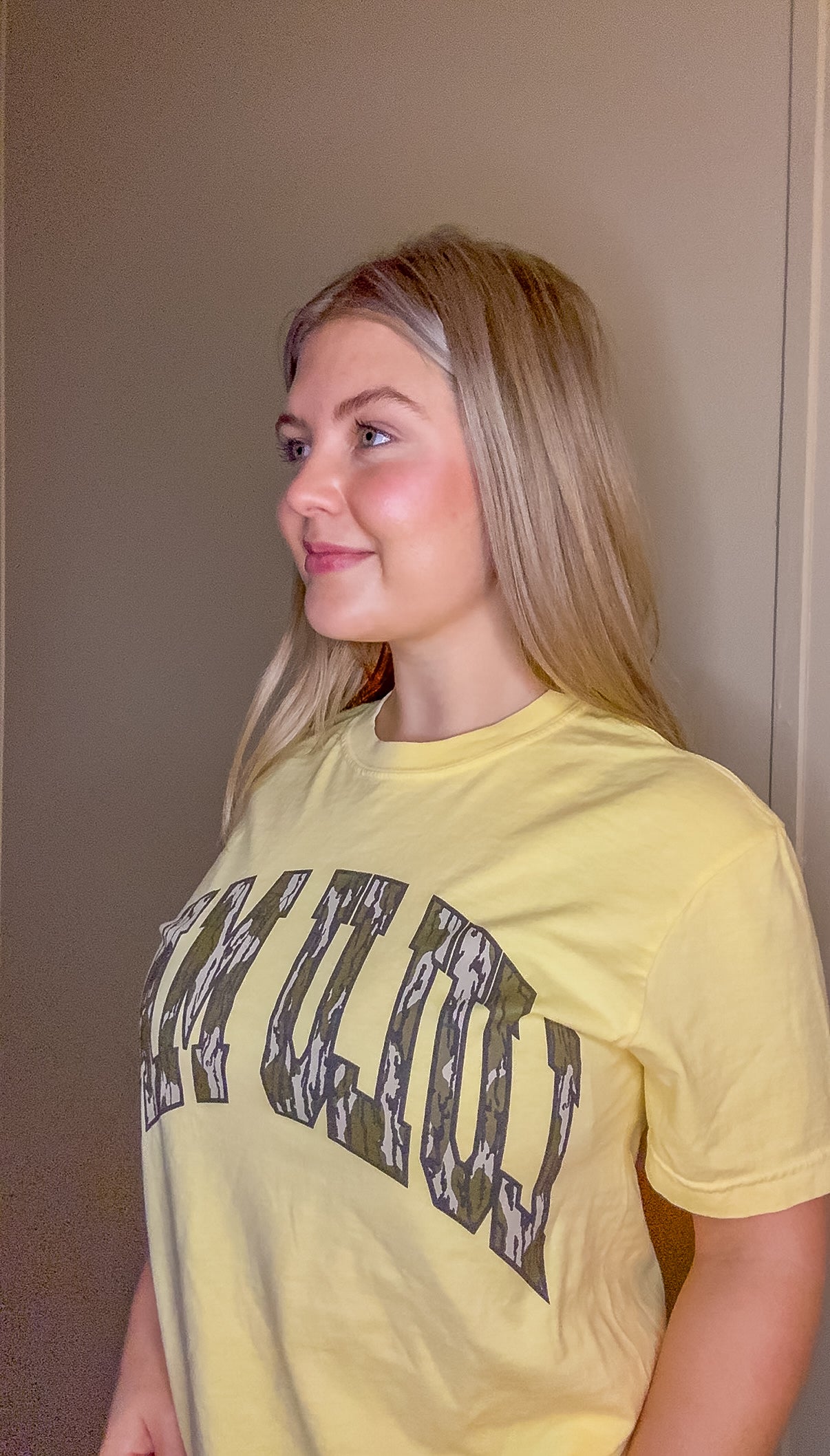 Lulu Mac Mossy Oak Bottomland Comfort Colors graphic tee in Butter yellow with camo collegiate lettering