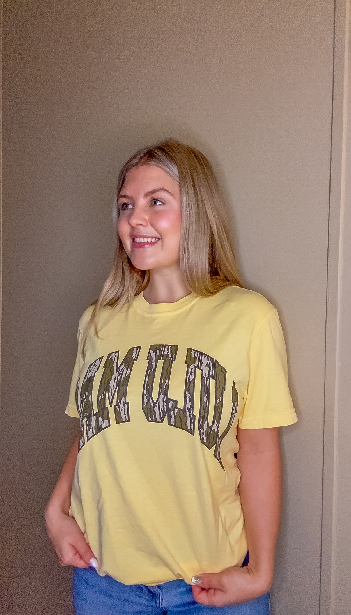 Lulu Mac Mossy Oak Bottomland Comfort Colors graphic tee in Butter yellow with camo collegiate lettering