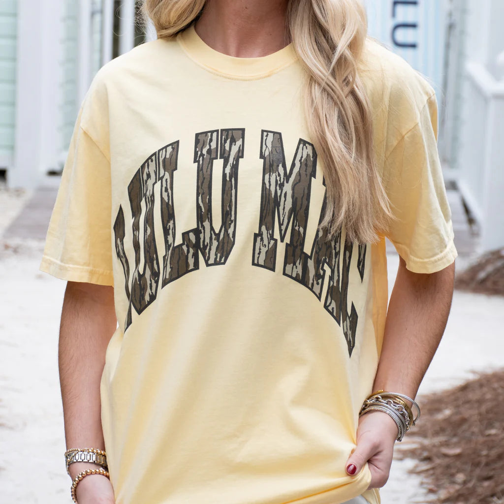 Lulu Mac Mossy Oak Bottomland Comfort Colors graphic tee in Butter yellow with camo collegiate lettering