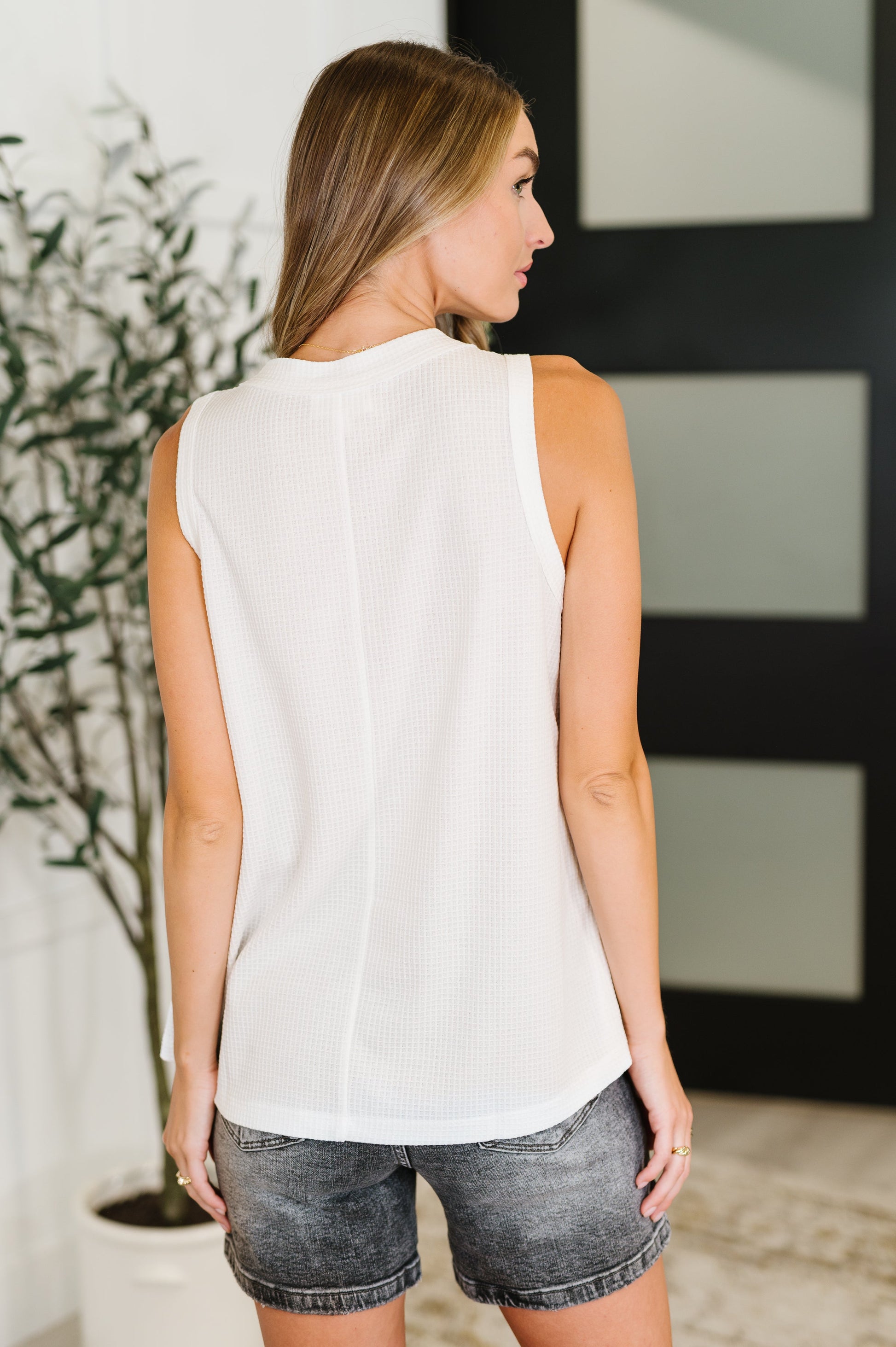 Ivory sleeveless blouse with buttons by Andree by Unit