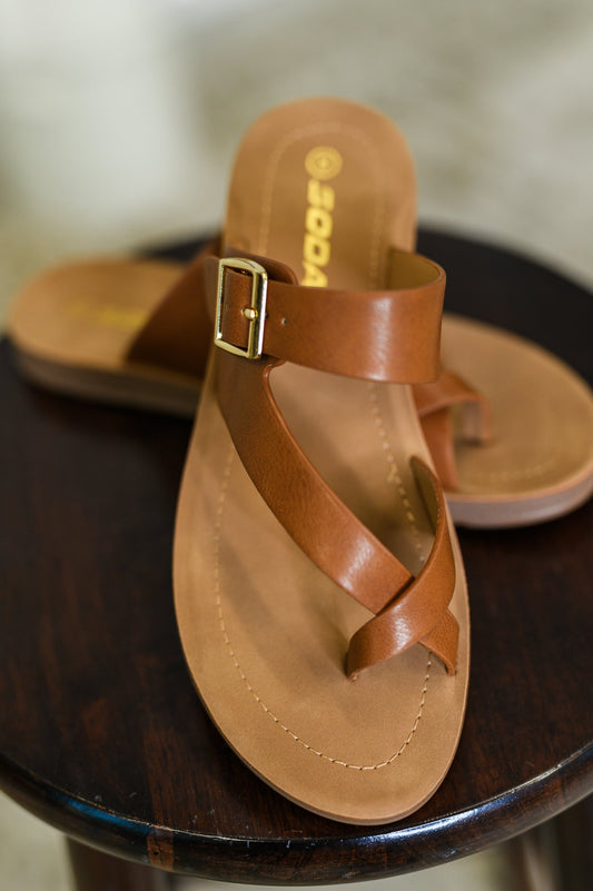 Tan sandals by Soda
Pleather Straps
Adjustable Buckle
Gold Hardware
Slip on Style
Round Toe
Man Made Materials