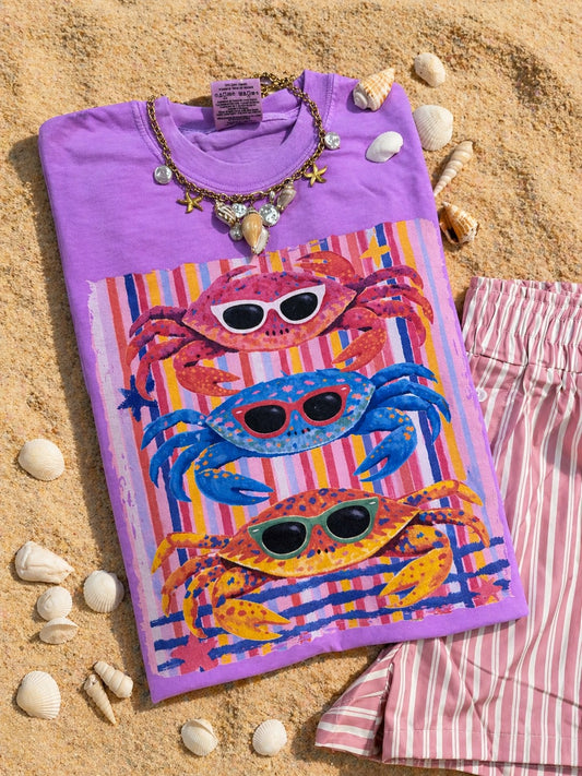 Neon violet Comfort Colors tee with colorful sunglasses crabs and striped beach-inspired graphic design.

Shopify Tags