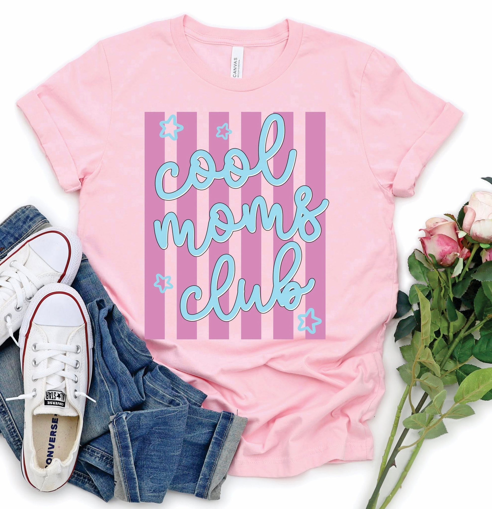 Cool Moms Club pink graphic t-shirt on Bella Canvas tee styled with jeans and sneakers