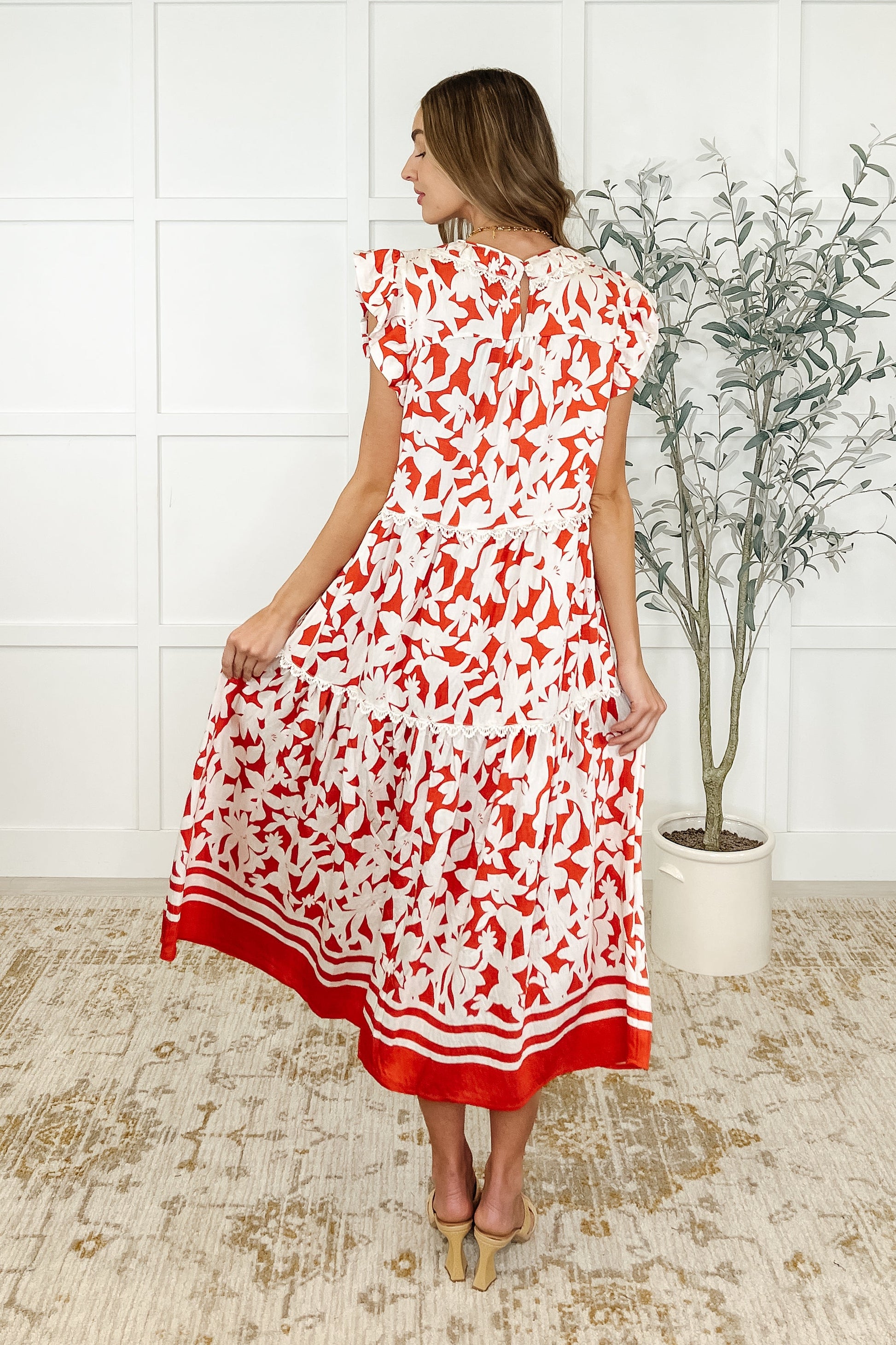 Dainty, lightweight woven, banded neckline, double layer flutter sleeve, keyhole closure, tiered, lace trim detail dress