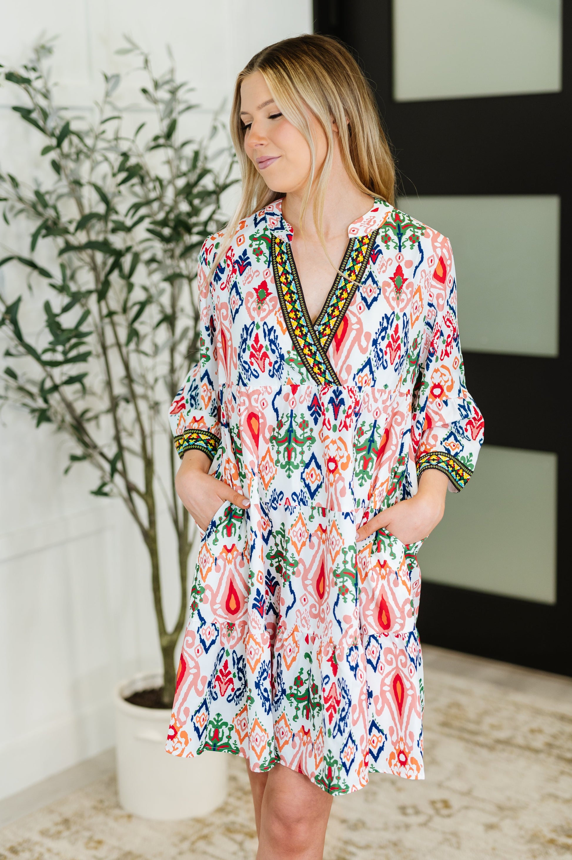 Boho Tiered Dress
Poplin Woven
No Stretch
Criss-Cross V-Neckline
Bell Sleeve
Machine Embroidered Details
Functional Side Pockets
Gathered Tiers
100% Polyester
True to Size