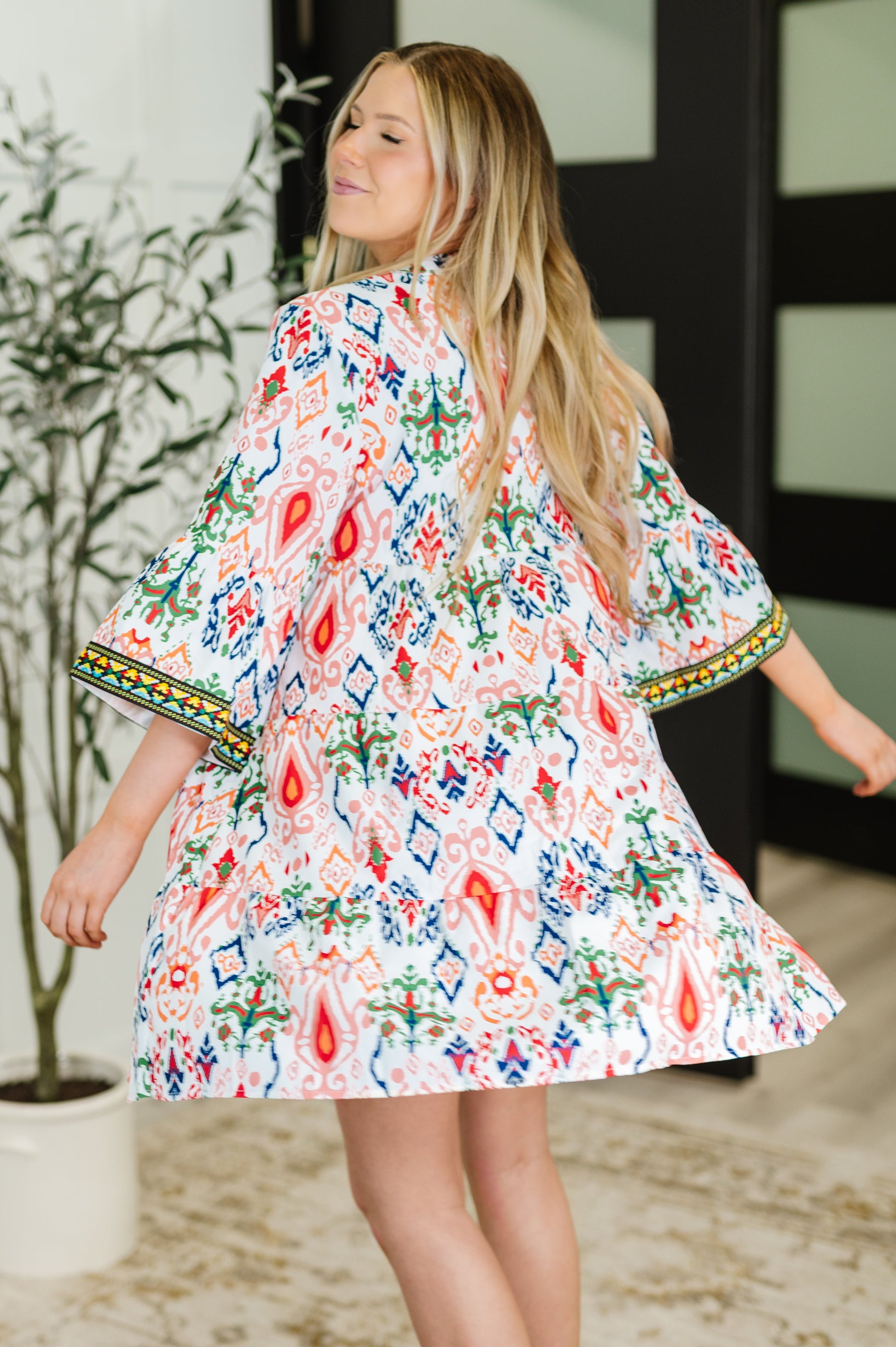Boho Tiered Dress
Poplin Woven
No Stretch
Criss-Cross V-Neckline
Bell Sleeve
Machine Embroidered Details
Functional Side Pockets
Gathered Tiers
100% Polyester
True to Size